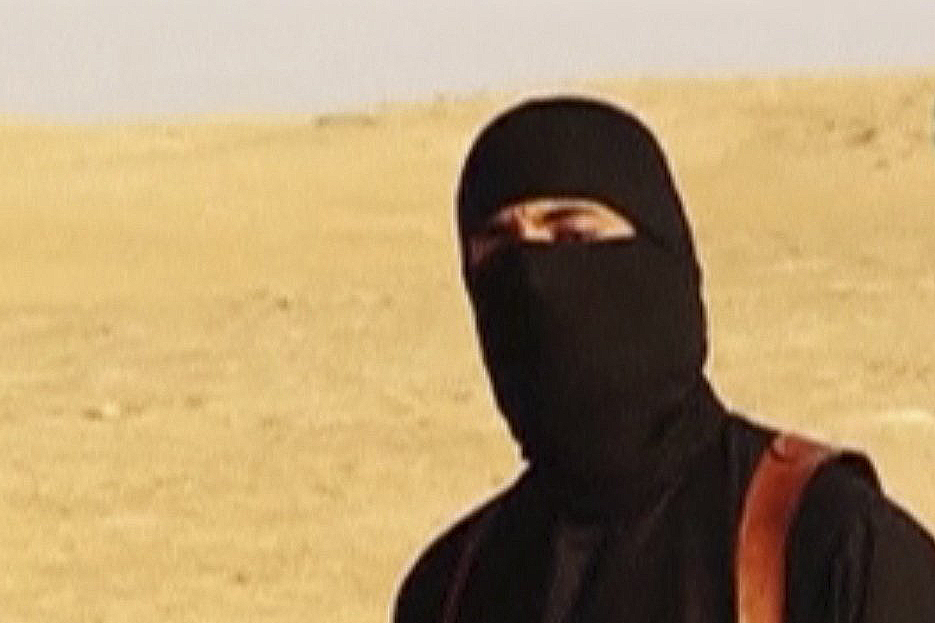The ISIS militant, who has been identified as a Briton named Mohammed Emwazi, seen in a propaganda video.