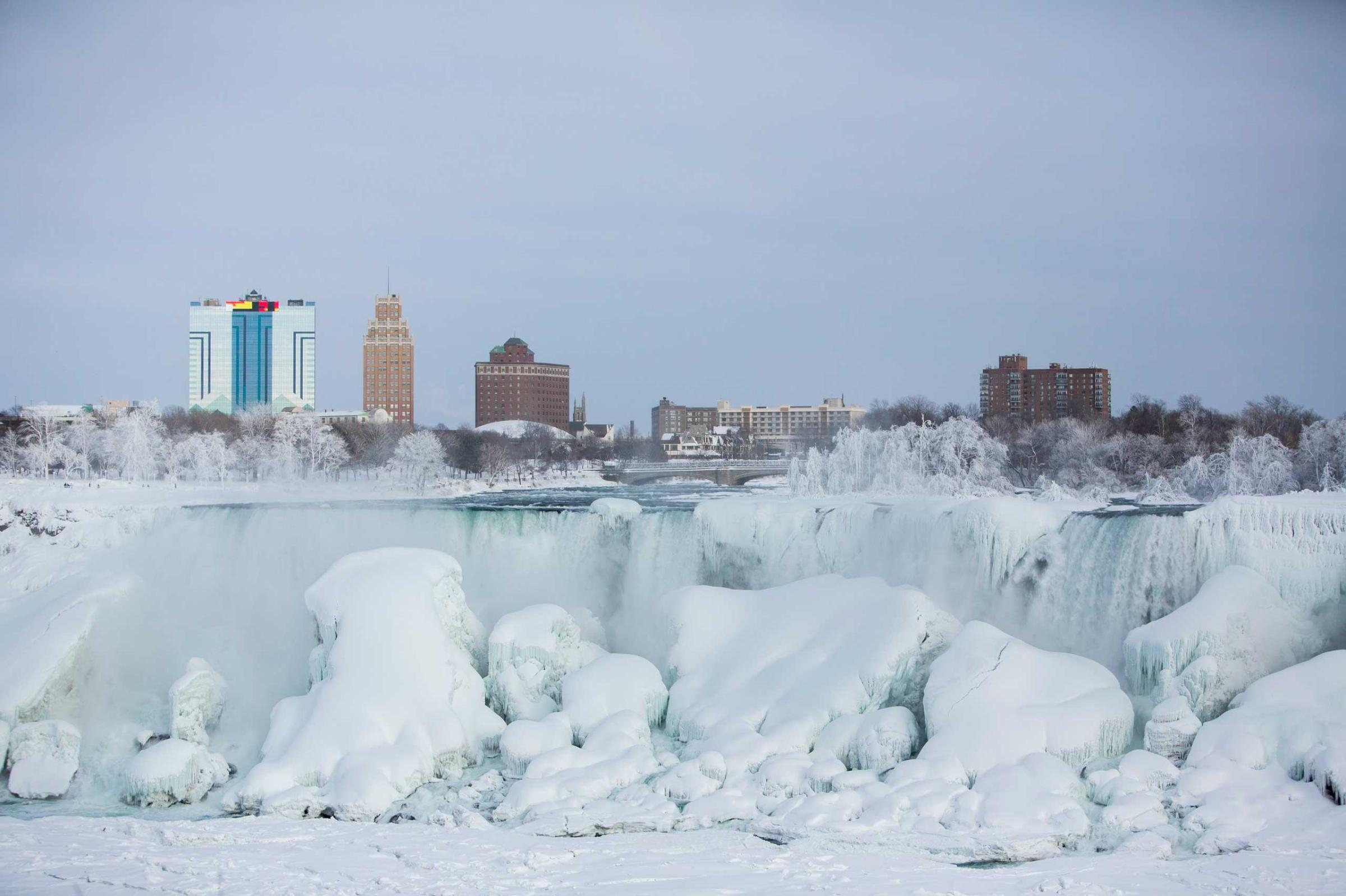 A partially frozen American Falls in sub freezing temperatures is seen in Niagara Falls, Ontario, Canada, Feb. 17, 2015.