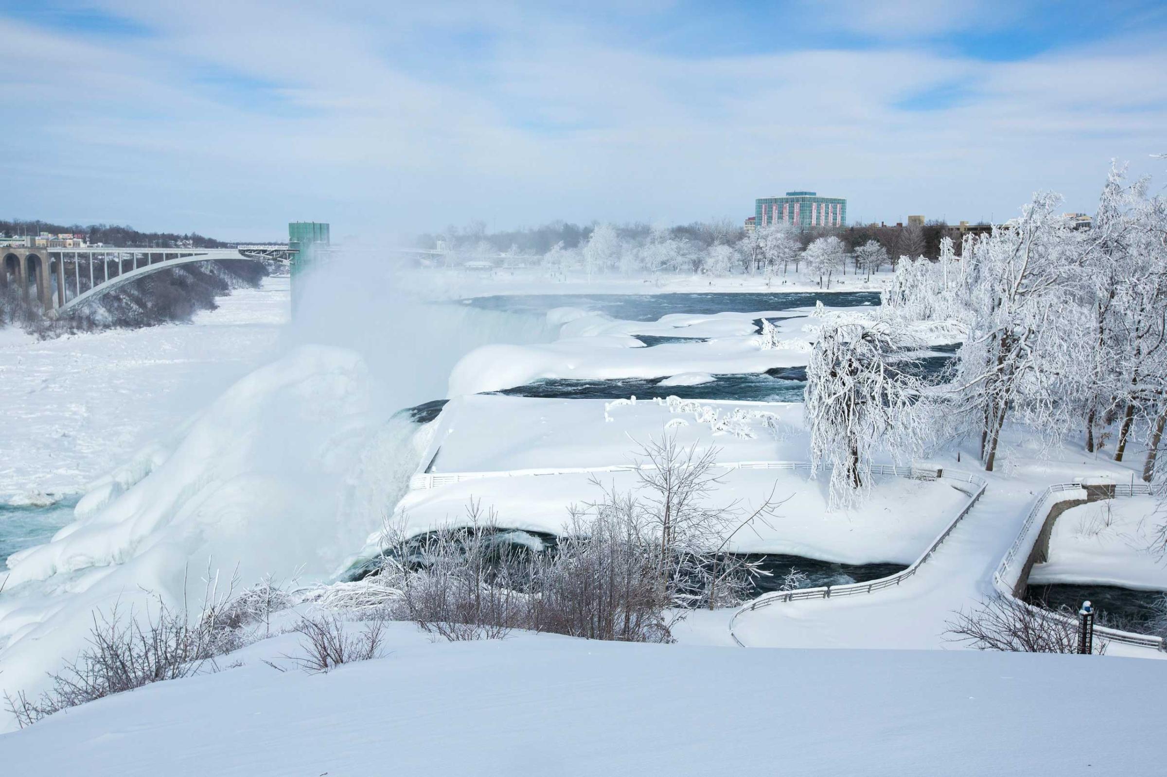 A snow-covered landscape is seen around the frozen Niagara Falls in Niagara Falls, Feb.17, 2015.