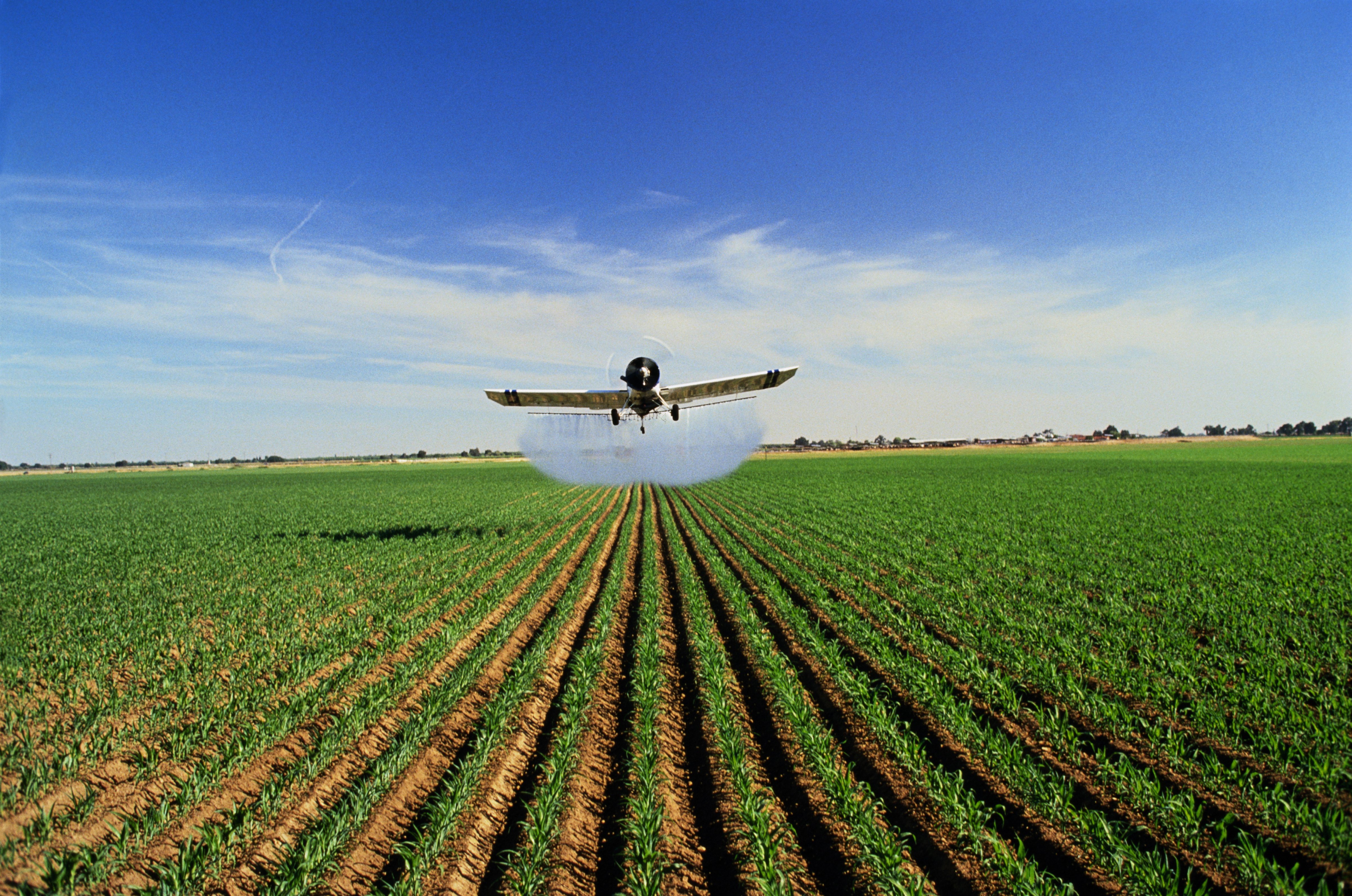Plane spraying pesticide (Getty Images)