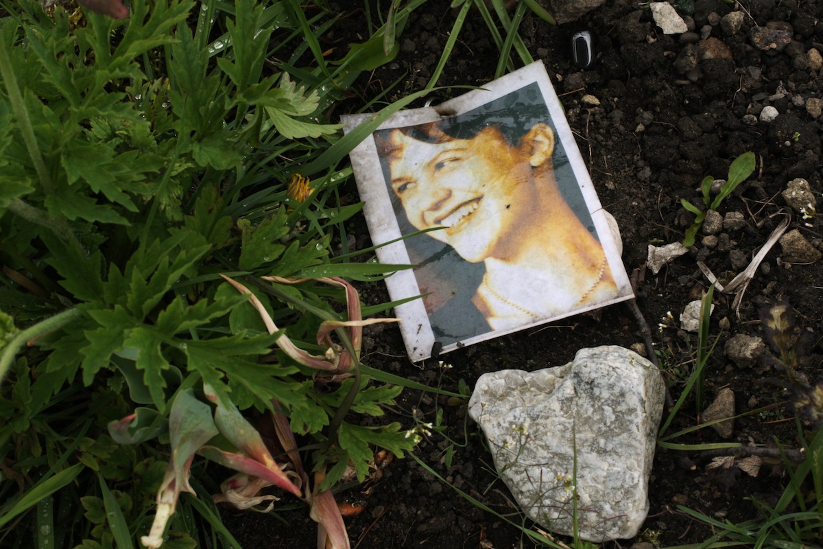 A photograph of Sylvia Plath (1932 - 1963) on her grave at St Thomas a Beckett churchyard, Heptonstall, West Yorkshire, May 5, 2011. (Amy T. Zielinski—Getty Images)