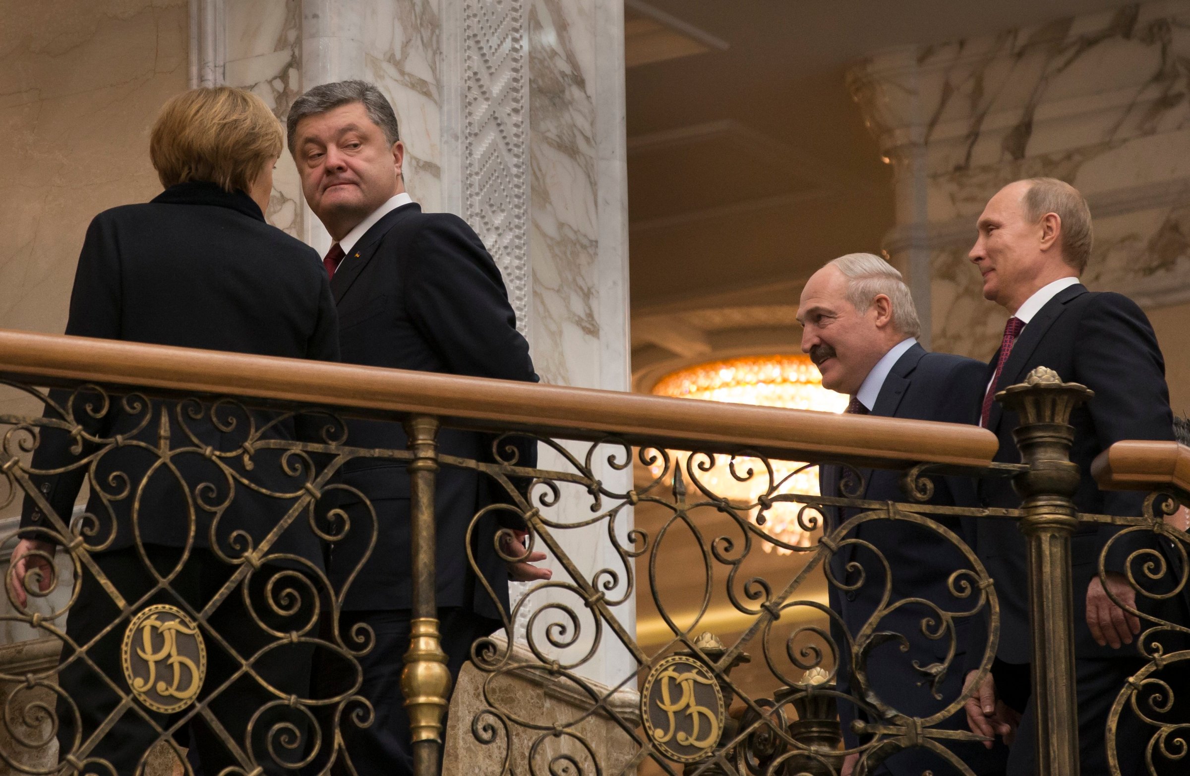 German Chancellor Angela Merkel, Ukrainian President Petro Poroshenko, Belarusian President Alexander Lukashenko, and Russian President Vladimir Putin, seen during peace talks in Minsk, Belarus on Feb. 11, 2015.