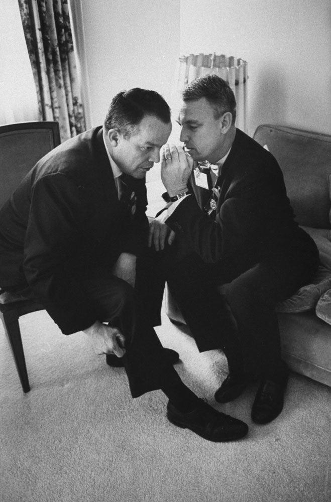 Arizona politician and future U.S. Attorney General Richard Kleindienst (left) confers with Nebraska's Richard Herman during the 1964 GOP National Convention in San Francisco.
