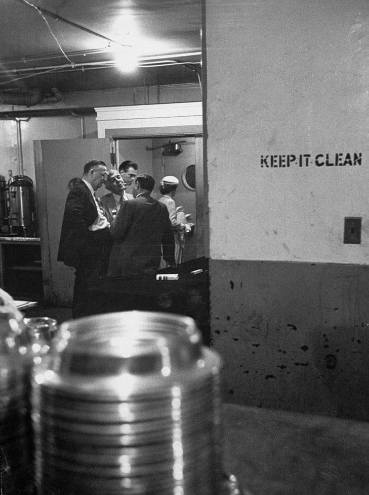 Republicans hold an informal conference in a kitchen during the 1952 GOP National Convention in Chicago.