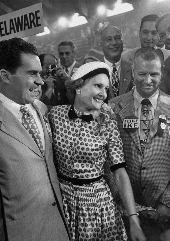 Vice-presidential nominee Richard Nixon and his wife Pat talk with photographers during the 1952 GOP National Convention in Chicago.