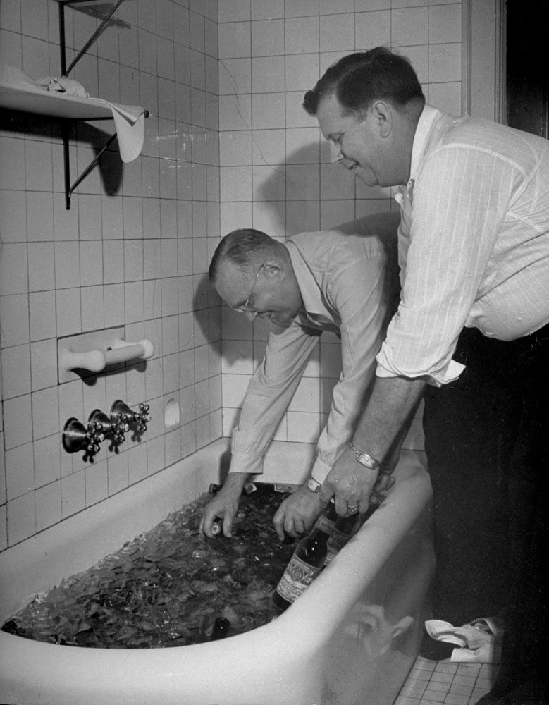 Pennsylvania delegates to the 1944 Republican National Convention in Chicago pull cold beers from a tub of ice after a caucus meeting.