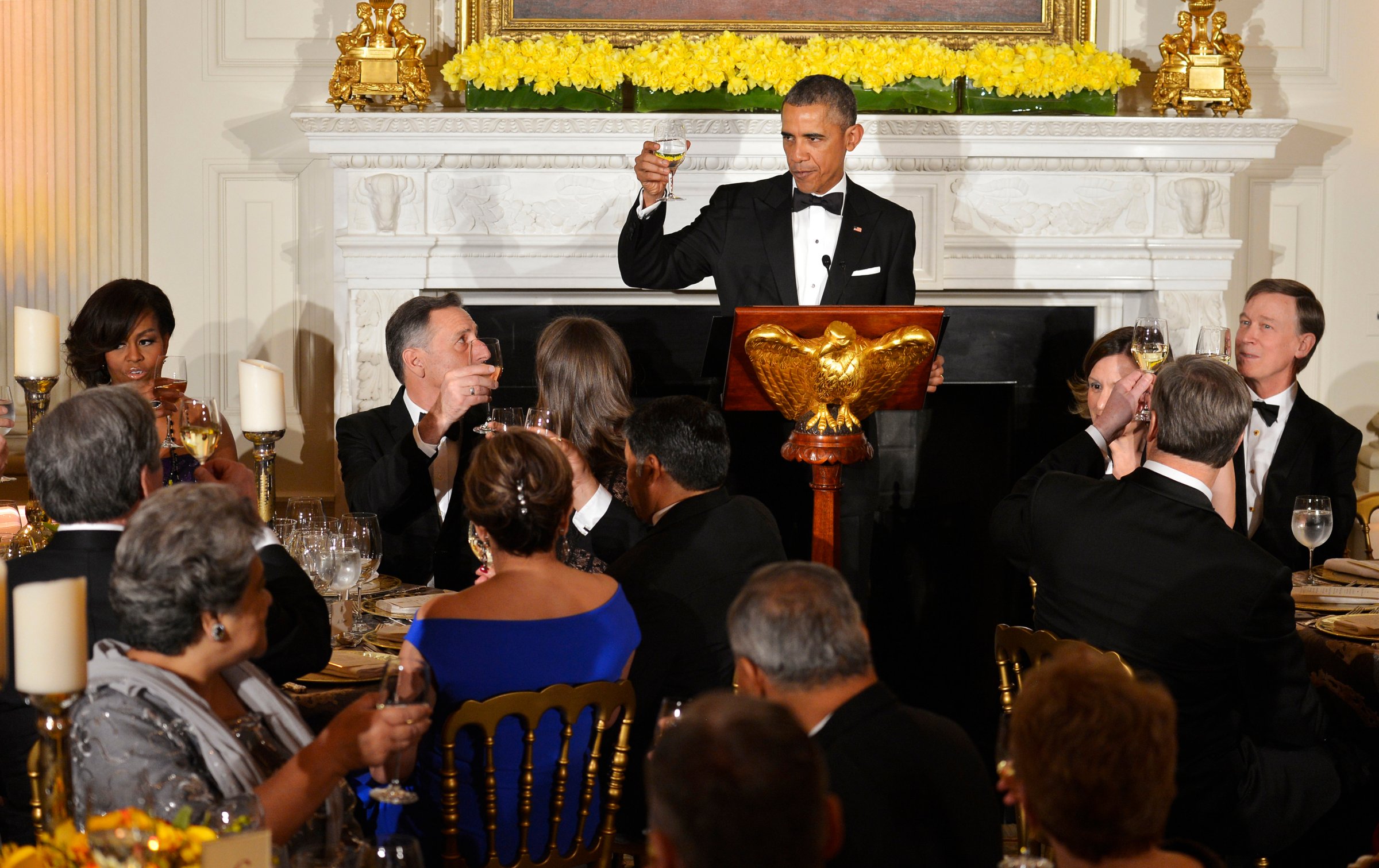 U.S. President Barack Obama toasts attendees from the National Governors Association at a dinner in the White House