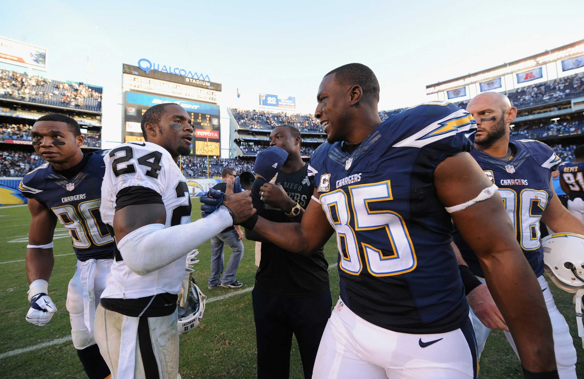 Charles Woodson #24 of the Oakland Raiders congratulated Antonio Gates #85 of the San Diego Chargers after the Chargers defeated the Oakland Raiders 13-6 in the game at Qualcomm Stadium on Nov. 16, 2014 in San Diego, Calif.