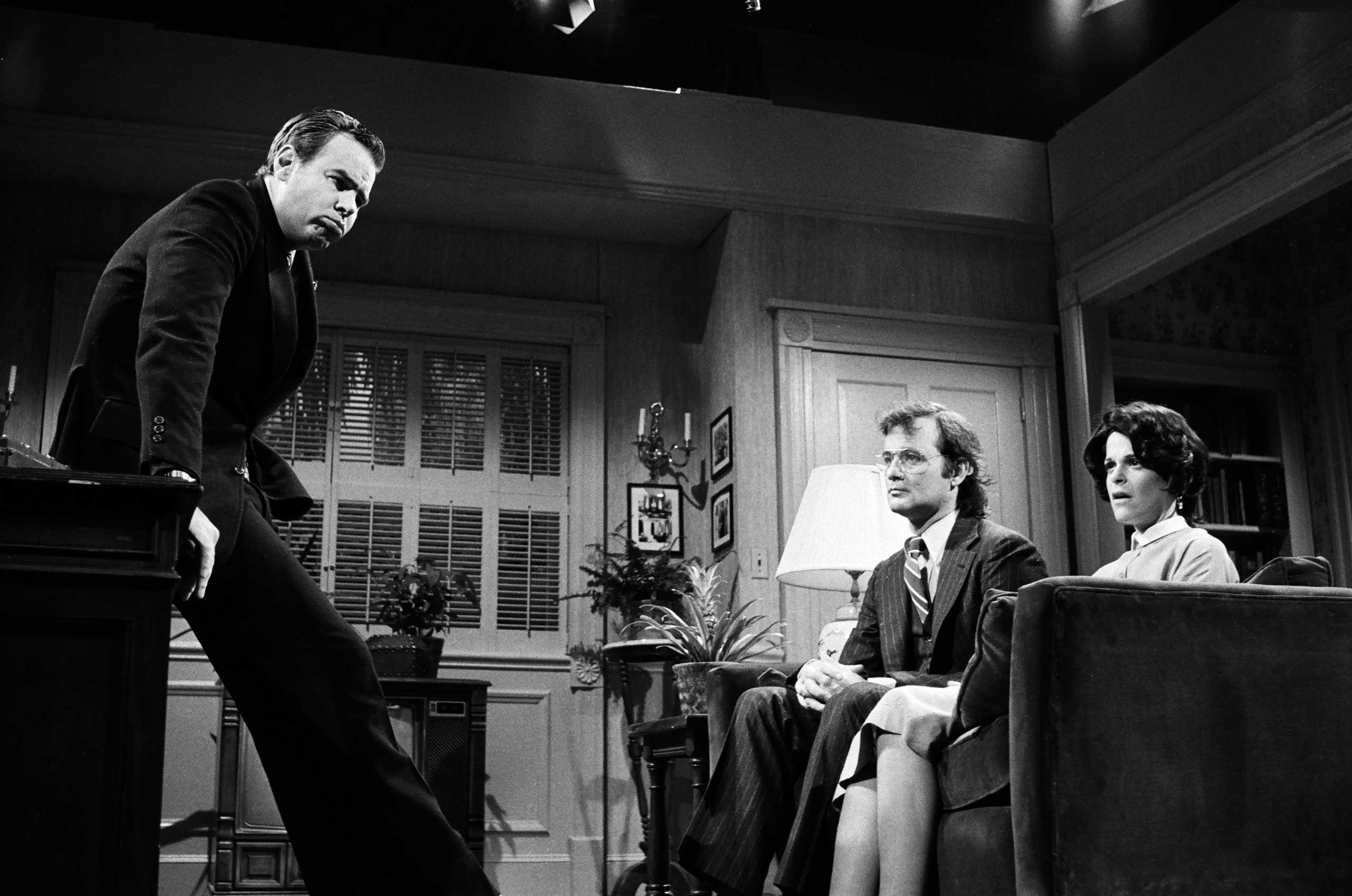From Left: Dan Aykroyd as Richard Nixon, Bill Murray as David Eisenhower, and Gilda Radner as Julie Nixon during the 'Blind Ambition' skit on May 26, 1979.