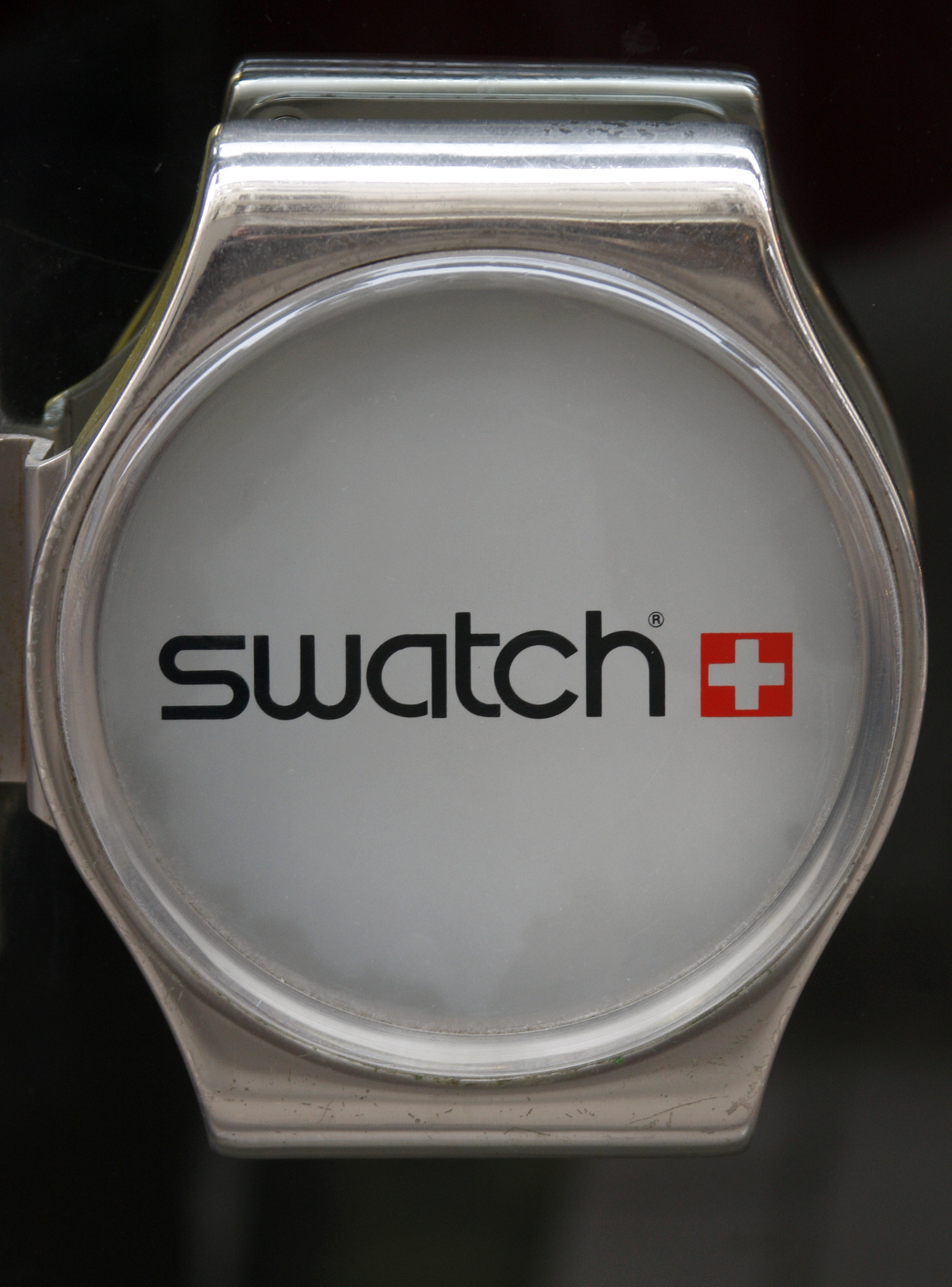The logo of Swiss watchmaker Swatch is seen on the door of a Swatch watches shop in Strasbourg on March 12, 2009. (Vincent Kessler—Reuters)