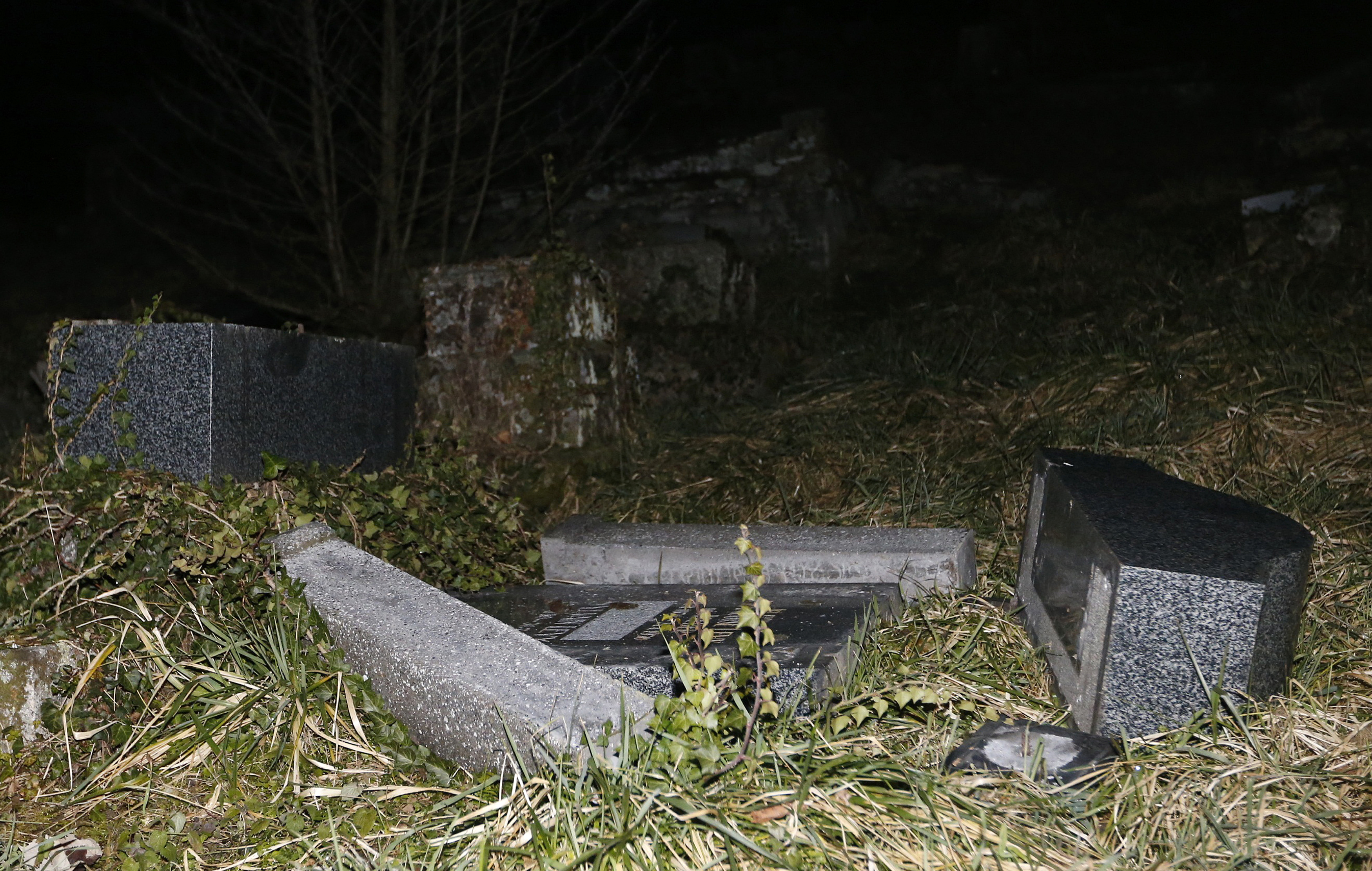 Desecrated tombstones are seen at Sarre-Union Jewish cemetery, eastern France, February 15, 2015