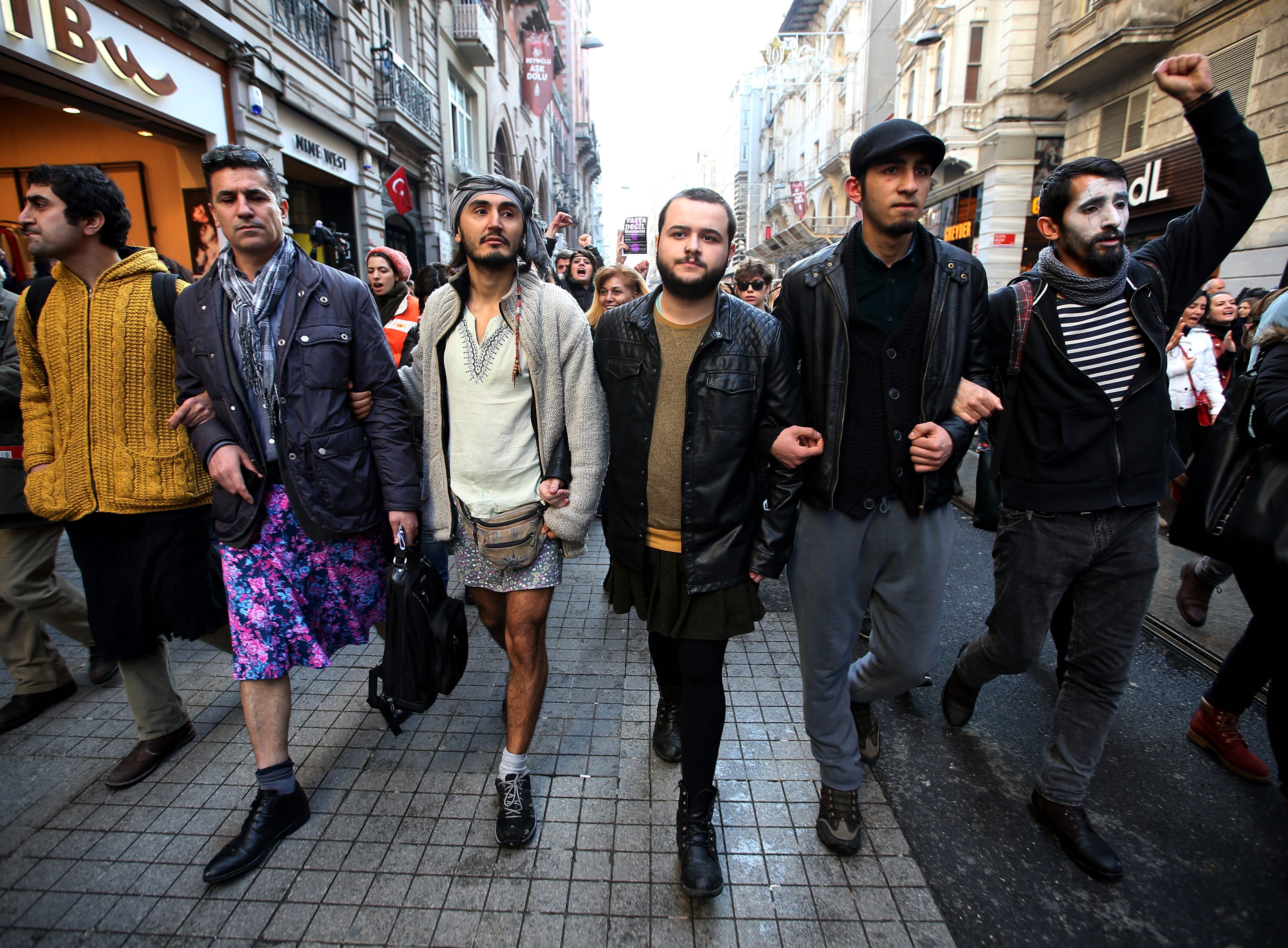 Some men wear skirts to show solidarity with women who have been protesting against violence against women since the recent murder of Ozgecan Aslan, a 20-year-old woman, during a march in Istanbul on Feb. 21, 2015. (Emrah Gurel&mdash;AP)