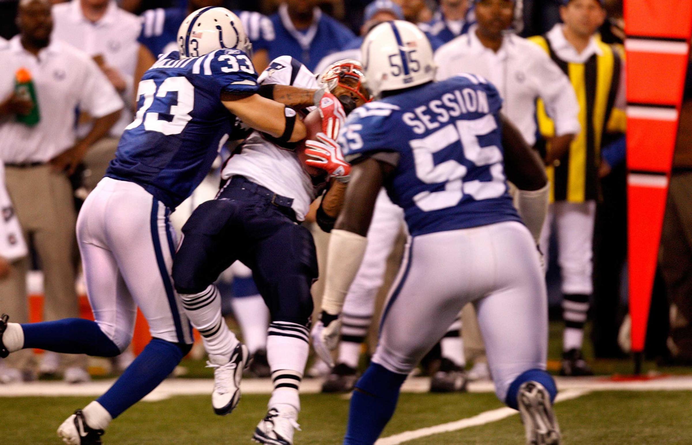 INDIANAPOLIS - NOVEMBER 15: New England Patriots running back Kevin Faulk (#33) makes the reception but it was marked just short of a first down as the New England Patriots face the Indianapolis Colts at Lucas Oil Stadium. The Patriots had to turn the ball over to the Colts, who went on to score. (Photo by /The Boston Globe via Getty Images)