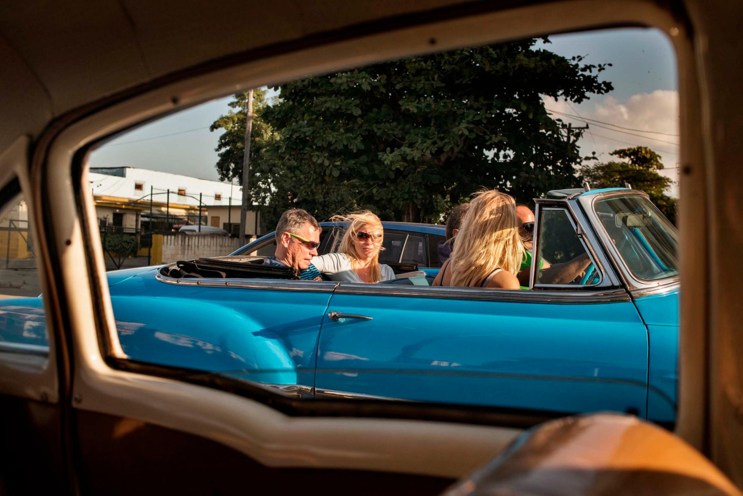January 2015. Imported to Cuba before the revolution, vintage American cars are often popular with tourists cruising around Havana.