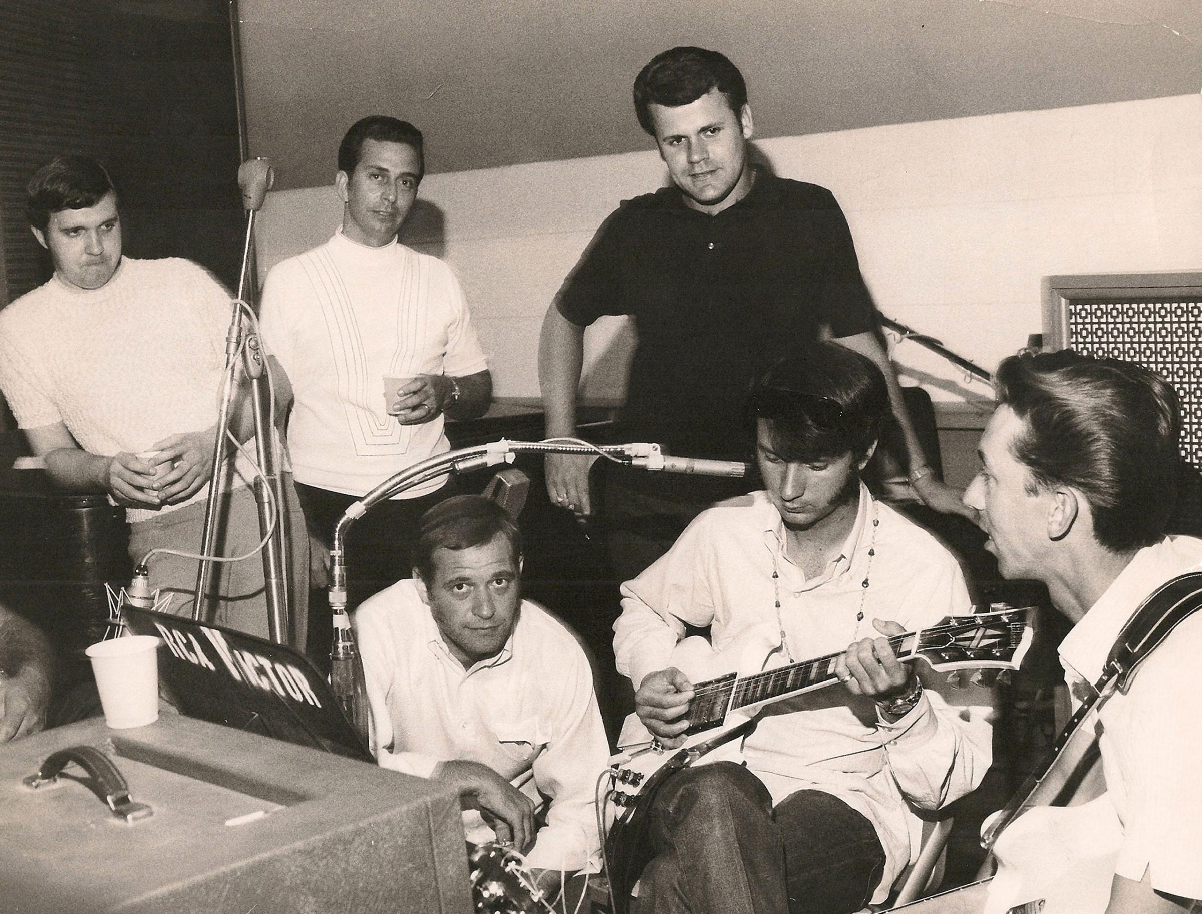 Pictured recording in RCA Studio A are (standing, l-r): Norbert Putnam, Lloyd Green, and Kenny Buttrey; (seated, l-r): Felton Jarvis, The Monkees’ Michael Nesmith, and Wayne Moss, 1960s.