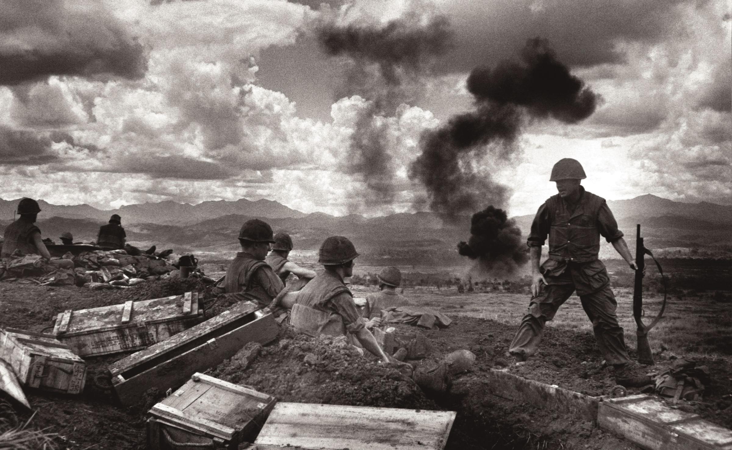Marines holding hilltop facing enemy bombed nightly by B52s from Guam. Con Thien Vietnam, September 1967.