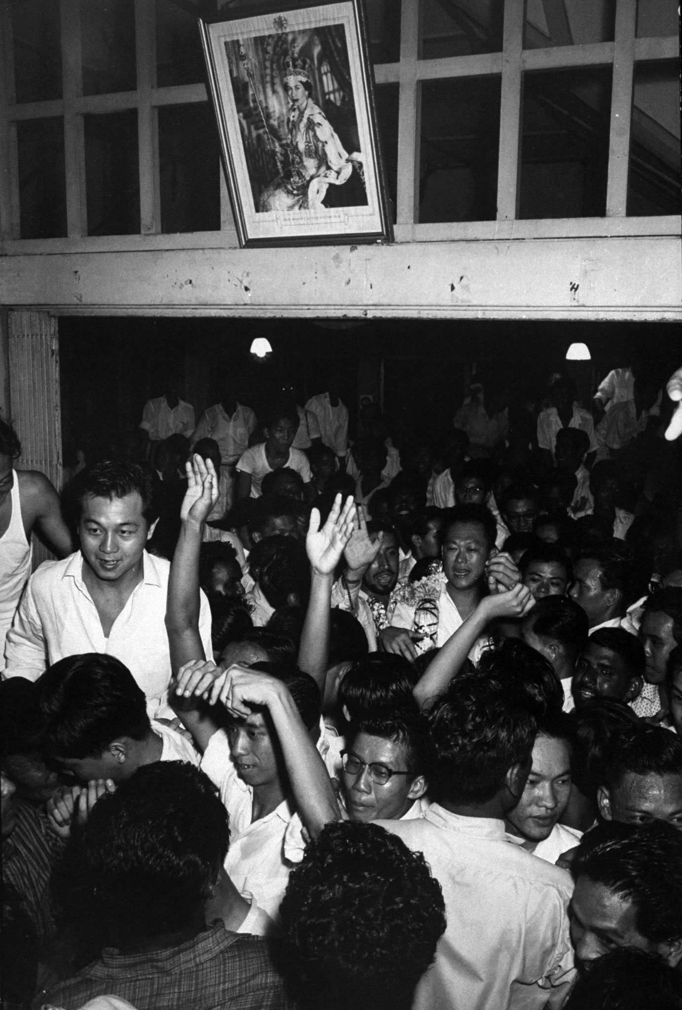Lee Kuan Yew amongst the cheering crowd, Singapore, 1959.