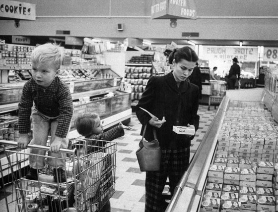 Working mother Jennie Magill shopping with her children at the super market.