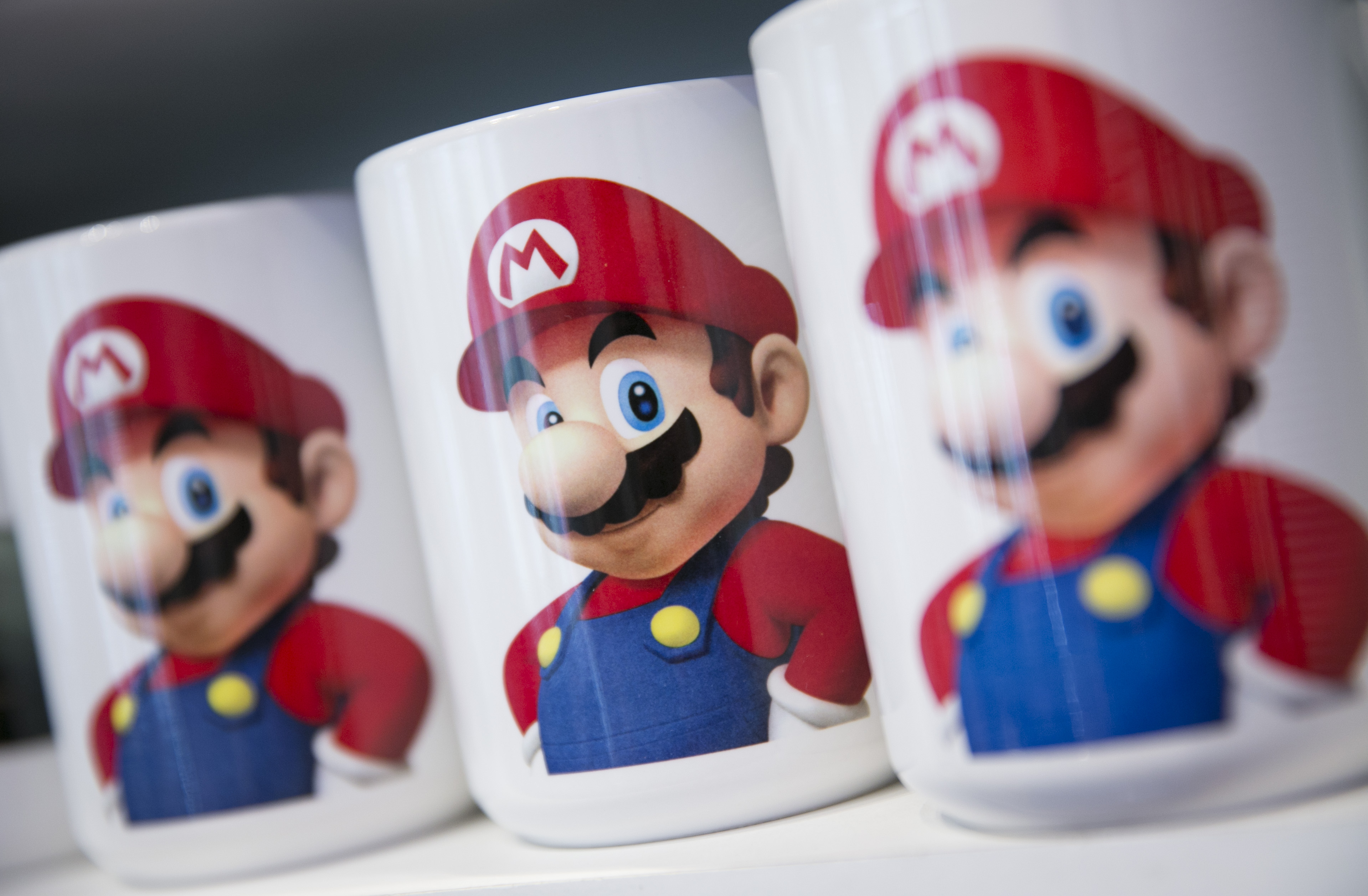 Nintendo Co.'s Super Mario is displayed on coffee mugs for sale at the Nintendo World store in New York, U.S., on Friday, May 17, 2013. (Bloomberg&mdash;Bloomberg via Getty Images)