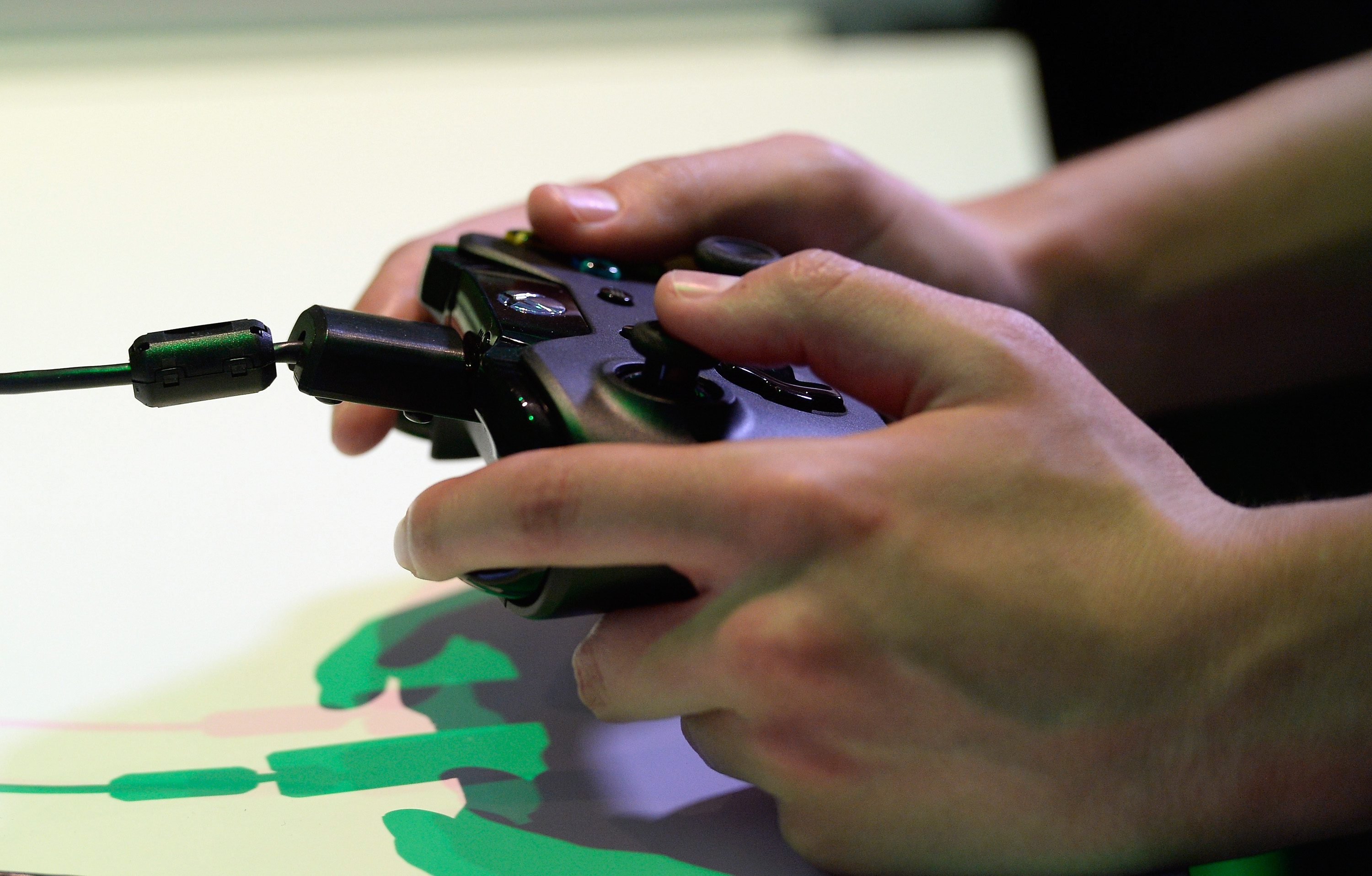 An Xbox One controller is used at the Microsoft Xbox booth during the Electronics Expo 2013  at the Los Angeles Convention Center on June 11, 2013 in Los Angeles, California. (Kevork Djansezian&mdash;Getty Images)