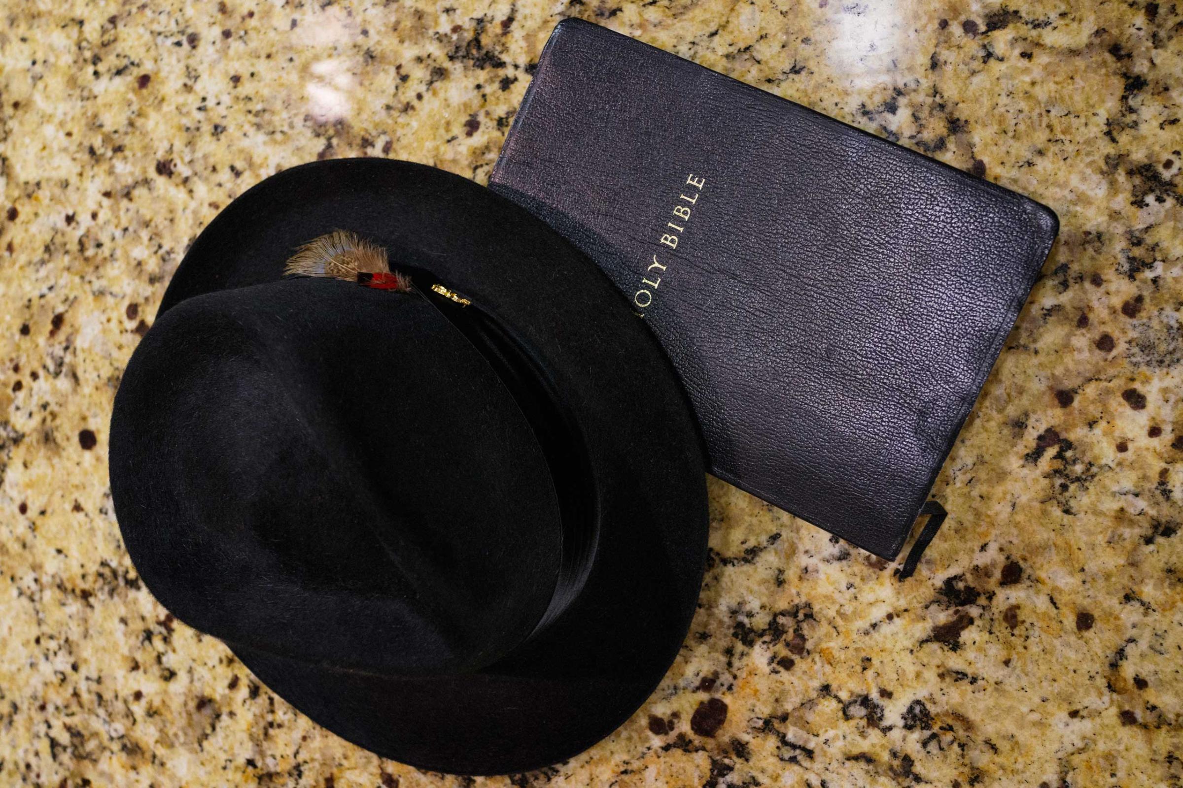 Pete Garrett's hat and bible rest on the kitchen counter prior to church service, at his home in Trussvile, Ala. on March 22, 2015.