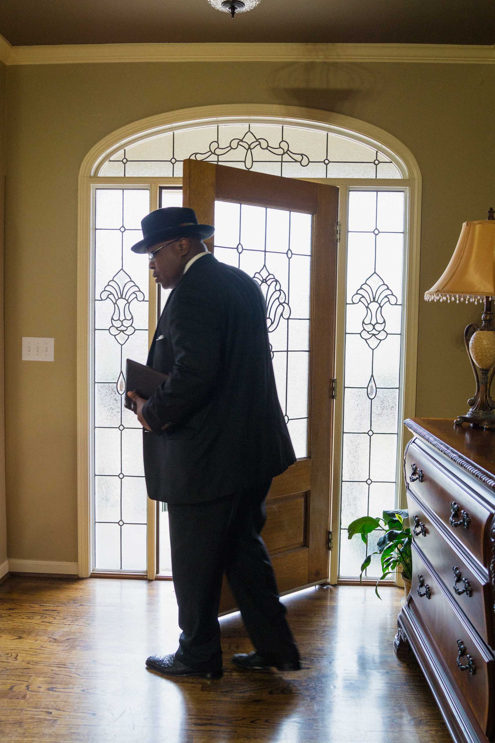 Pete Garrett prepares to leave home to attend Sunday worship at 16th Street Baptist Church in Birmingham on March 22, 2015.