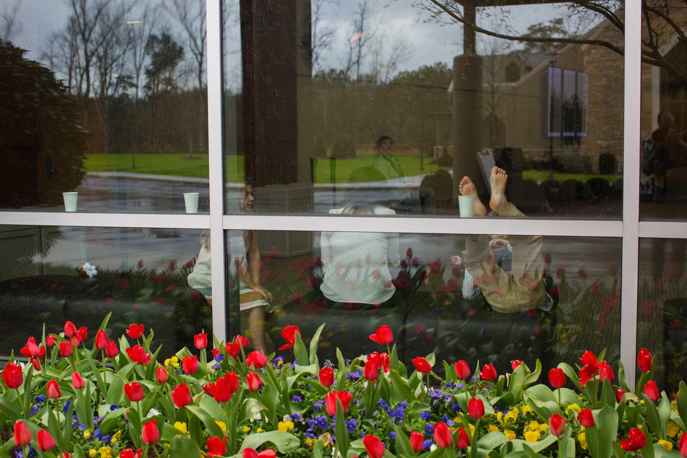 A family waits outside of the auditorium at Church of the Highlands in Birmingham, Ala. on March 22, 2015.