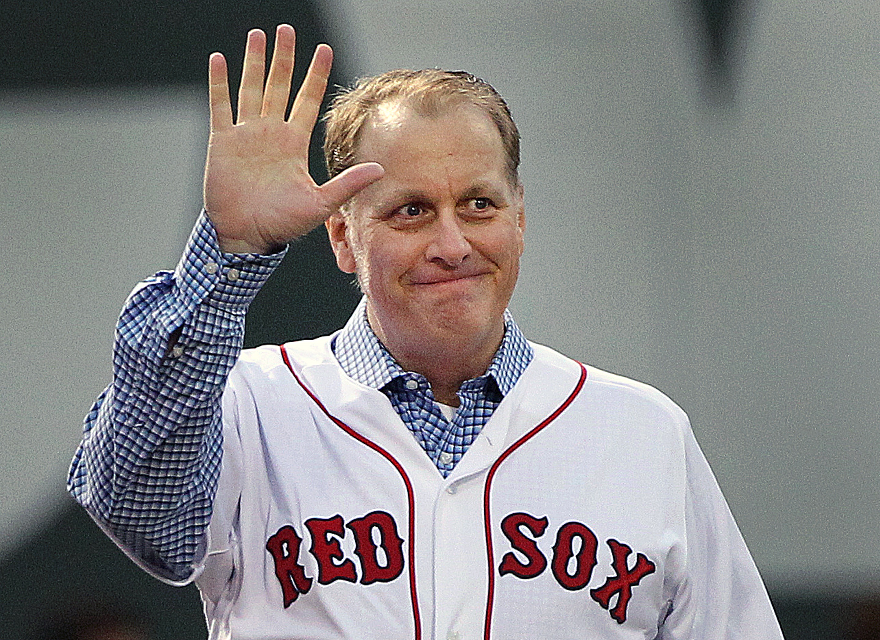 Former Boston Red Sox pitcher Curt Schilling is honored before a game between the Red Sox and the Atlanta Braves on May 28, 2014 in Boston. (Boston Globe via Getty Images)