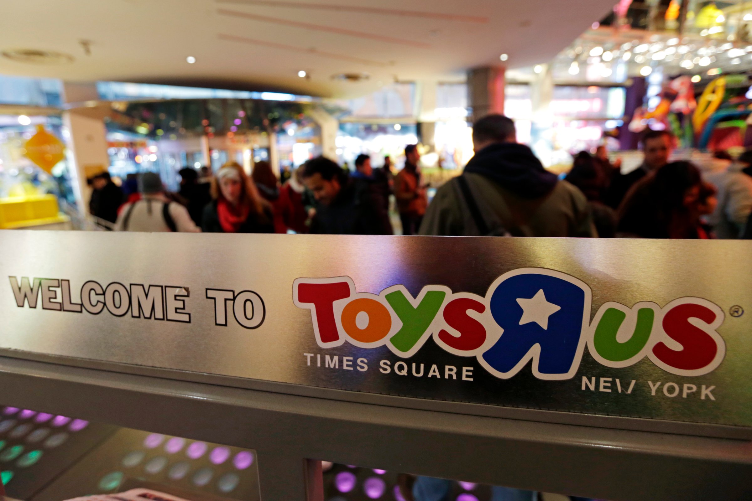 The Toys R Us Inc. logo is displayed inside a store ahead of Black Friday in New York, U.S., on Thursday, Nov. 27, 2014