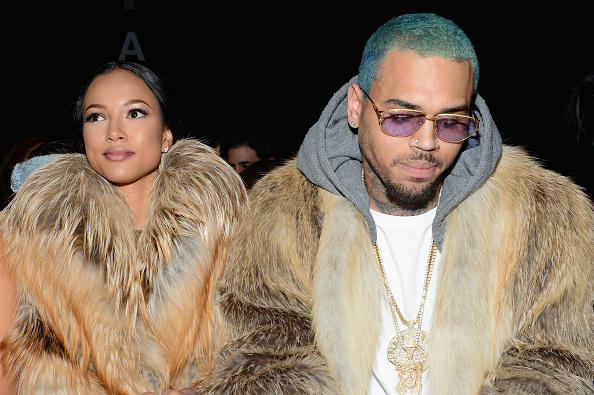 Karrueche Tran and Chris Brown attend the Michael Costello fashion show during Mercedes-Benz Fashion Week at the Lincoln Center in New York City on Feb. 17, 2015 (Noam Galai— Getty Images)