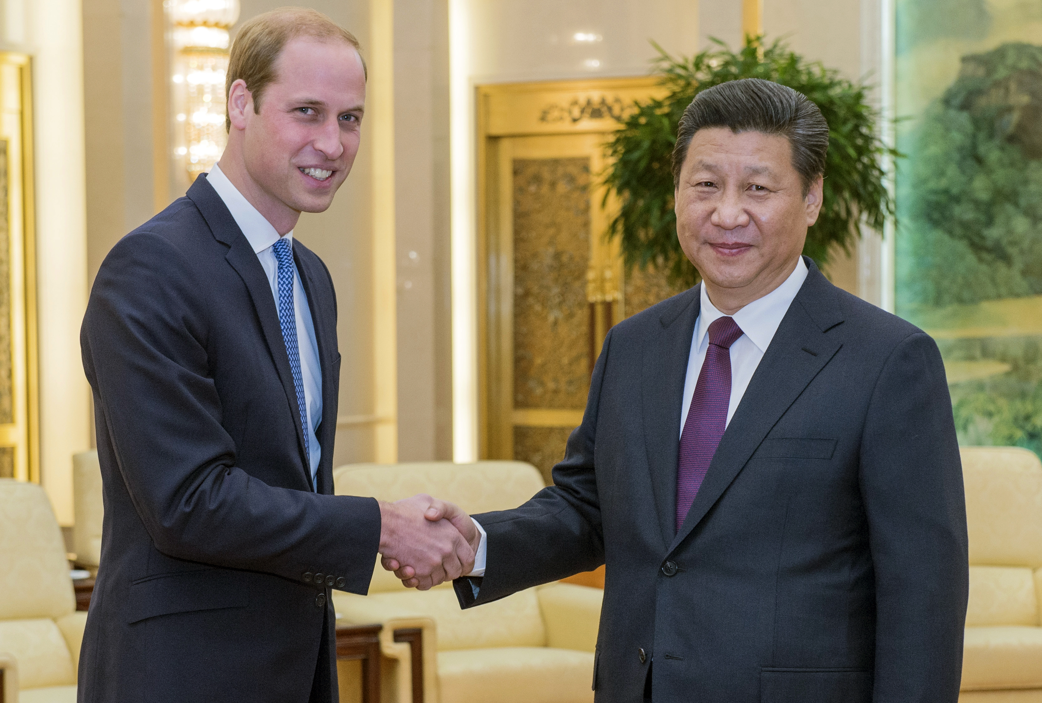Prince William, Duke of Cambridge, meets with Chinese President Xi Jinping at the Great Hall of the People on March 2, 2015 in Beijing, China. (WPA Pool—Getty Images)