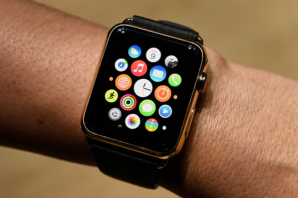 An attendee displays the Apple Watch Edition during the Apple Inc. Spring Forward event in San Francisco, Calif. on March 9, 2015. (Bloomberg—Getty Images)