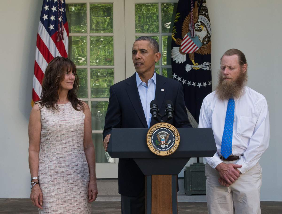 President Obama hails Bergdahl's return home last May with his parents, Jani and Bob. (J.H. Owen - Pool / Getty Images)