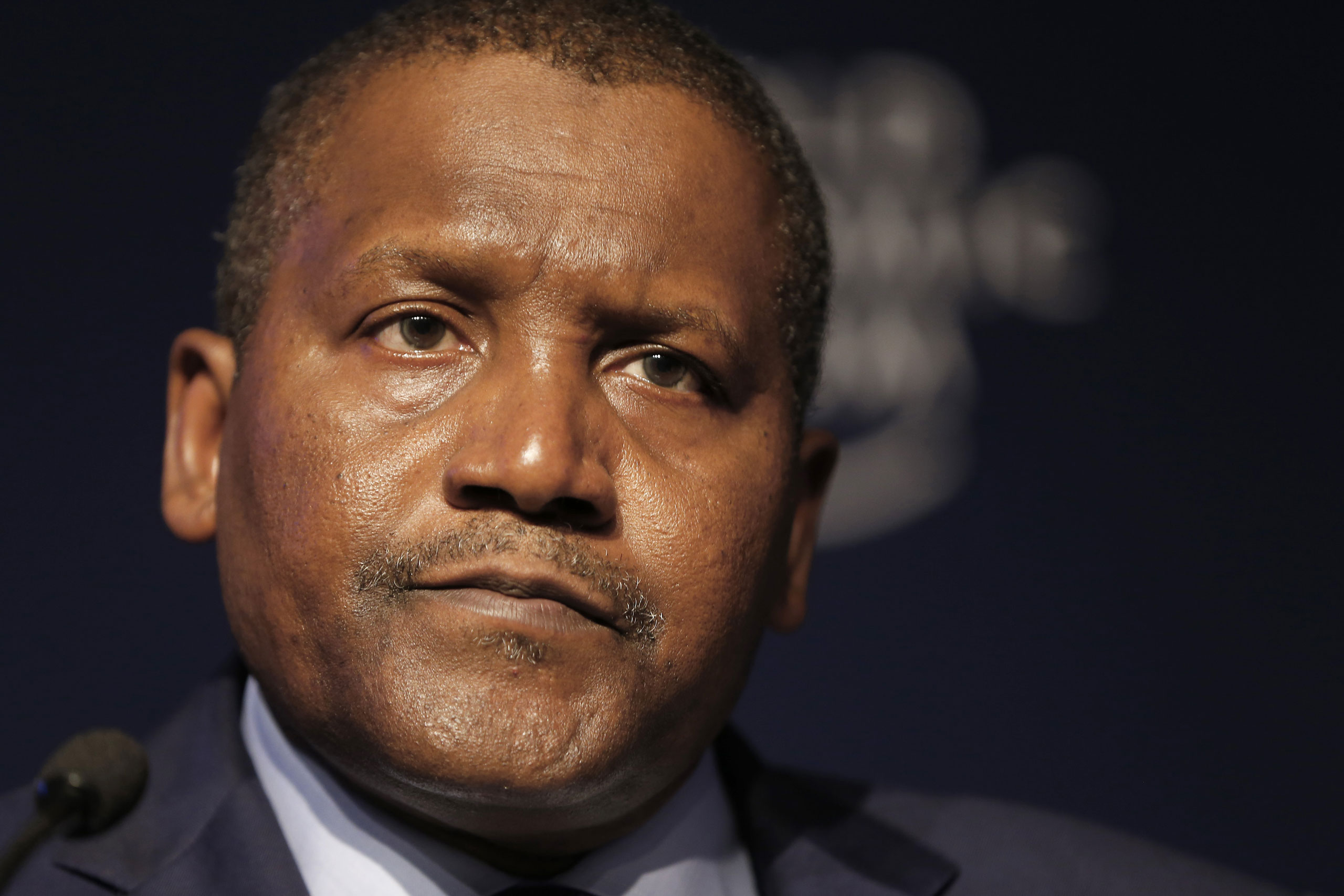 Aliko Dangote, billionaire and chief executive officer of Dangote Group, pauses during a session on day two of the World Economic Forum (WEF) in Davos, Switzerland, Jan. 22, 2015. (Jason Alden—Bloomberg/Getty Images)