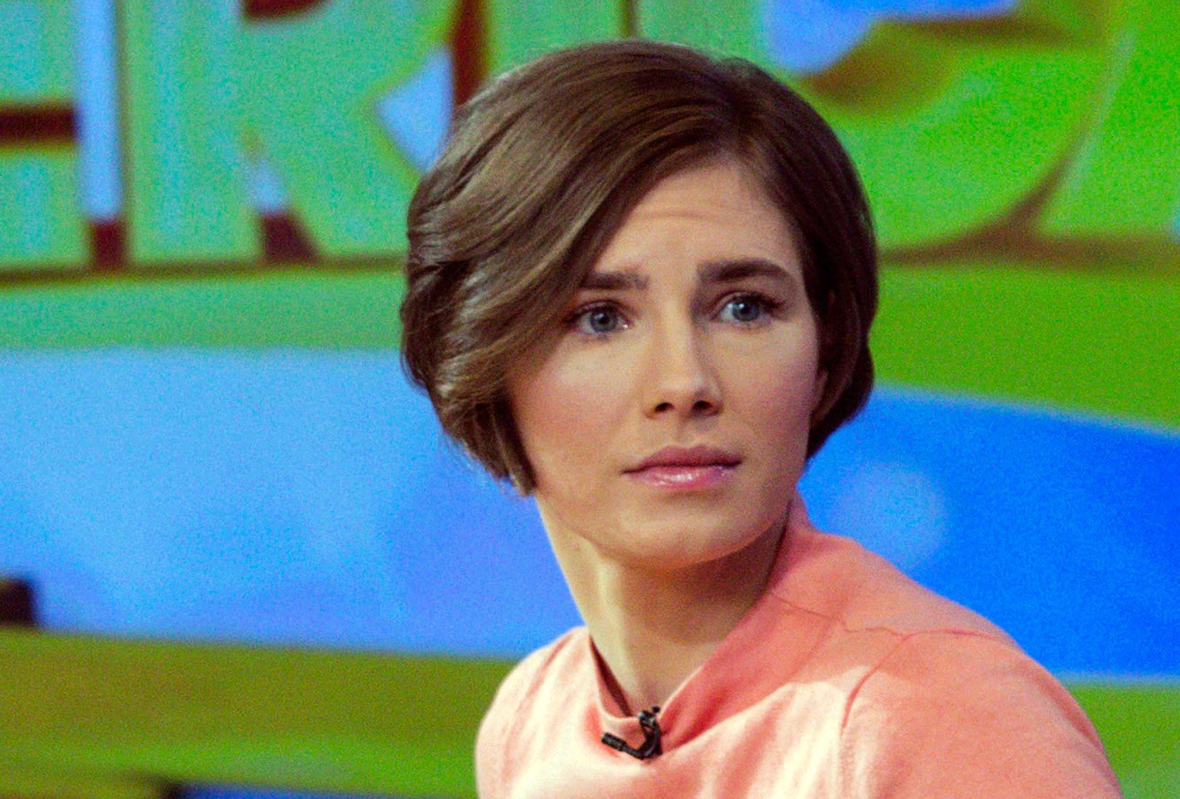 Amanda Knox reacts while being interviewed on the set of ABC's "Good Morning America" in New York in this January 31, 2014 file photo.