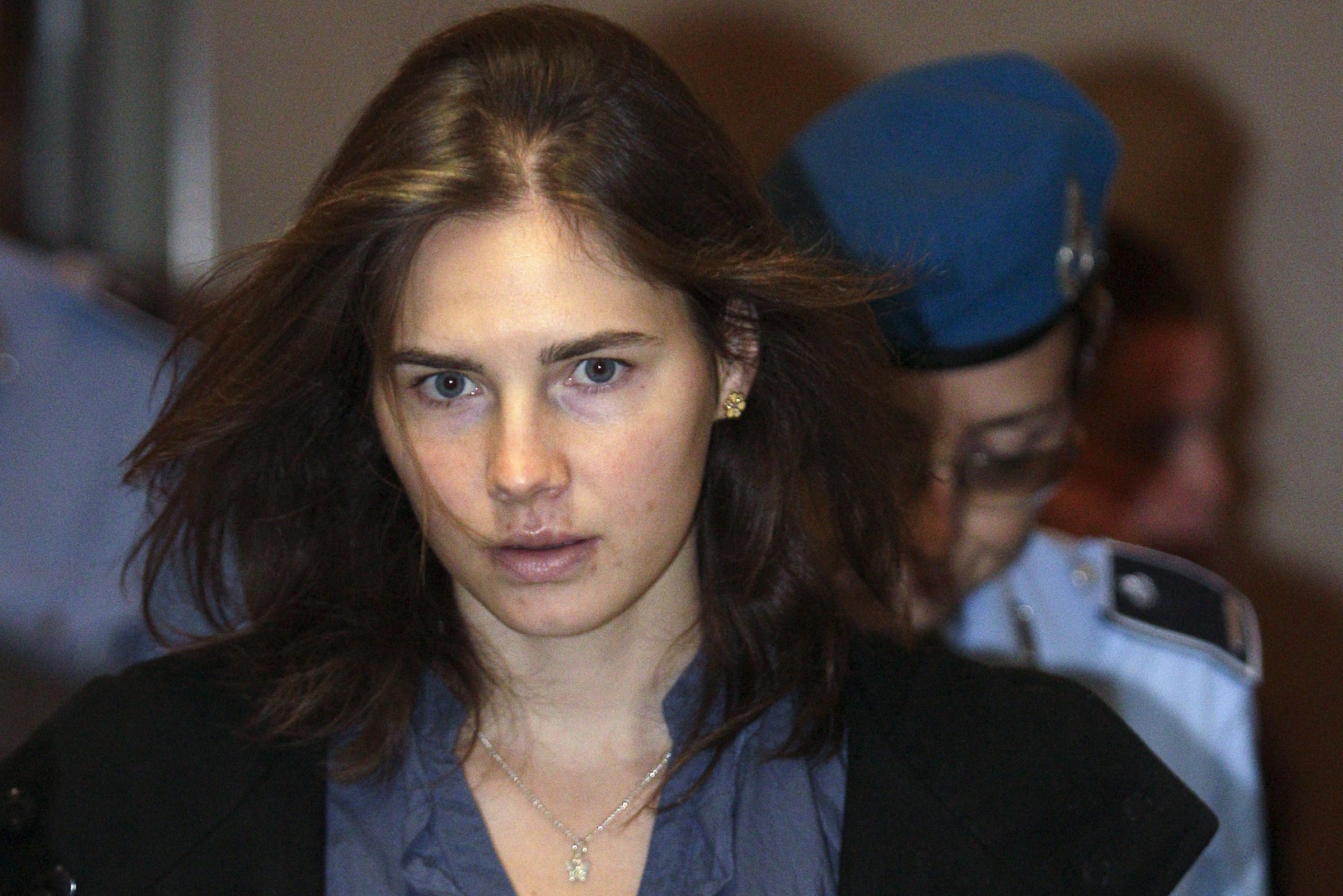 File photo of Knox, the U.S. student convicted of murdering her British flatmate in Italy in November 2007, arriving at the court during her appeal trial session in Perugia
