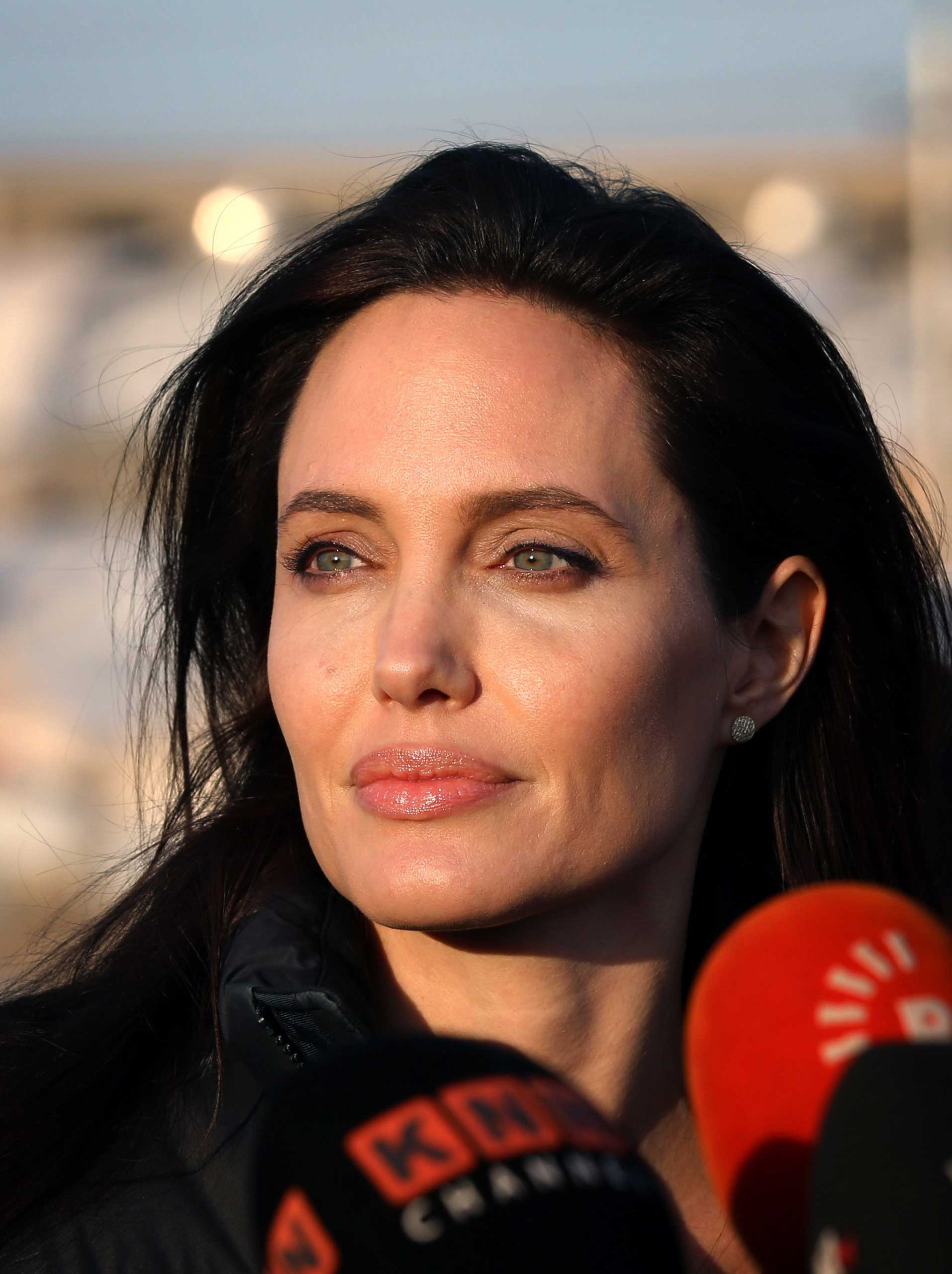 Angelina Jolie pauses as she delivers a speech during a visit to a camp for displaced Iraqis in Khanke, a few kilometers from the Turkish border in Iraq's Dohuk province on Jan. 25, 2015. (Safin Hamed—AFP/Getty Images)