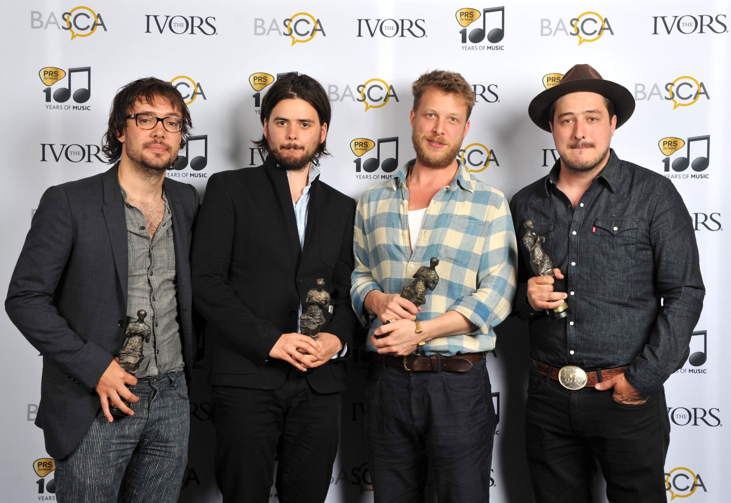 Mumford & Sons wins the International Achievement Awards at the 59th Ivor Novello Awards in London, England on May 22, 2014.