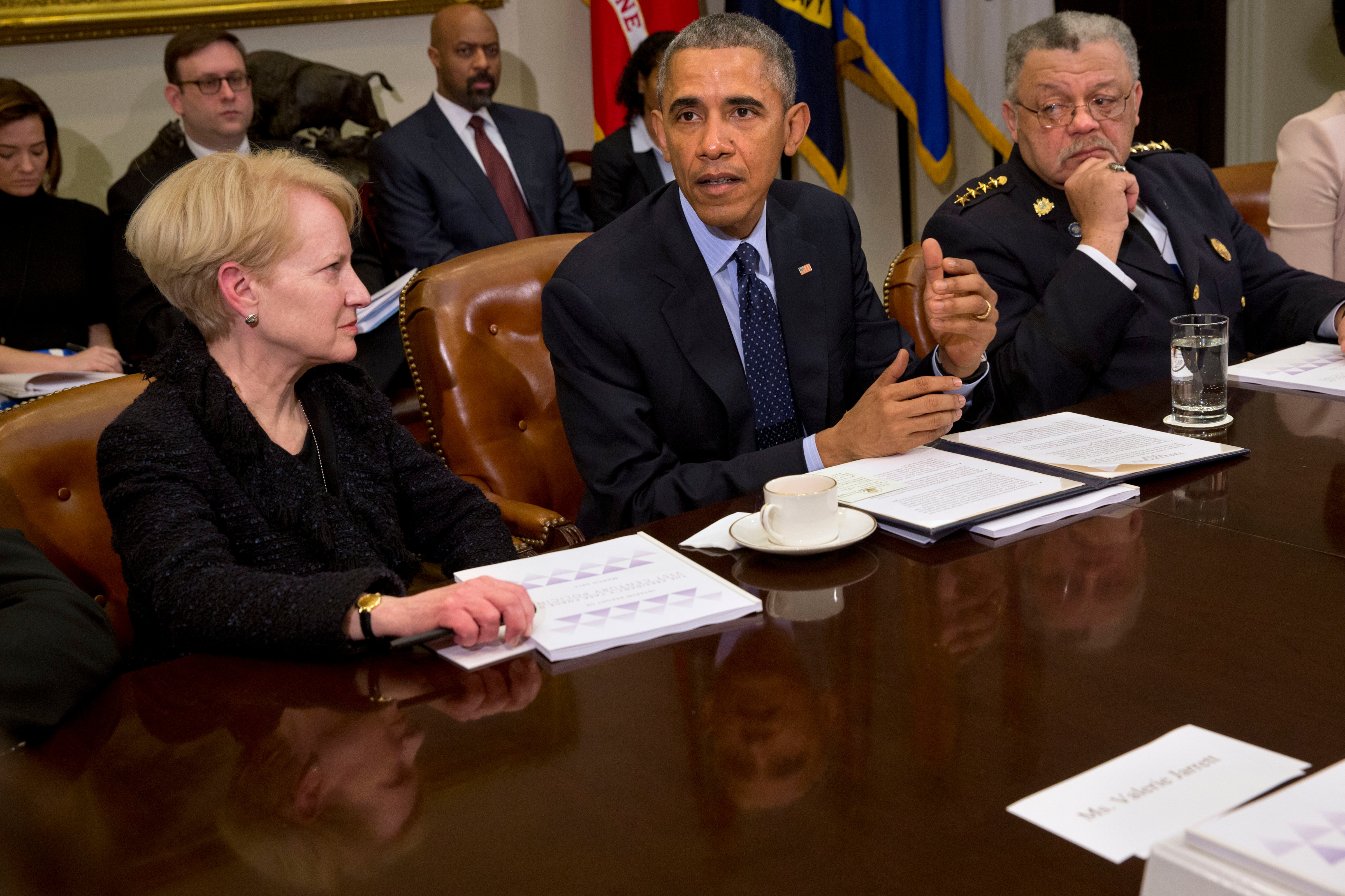 President Barack Obama, flanked by former Assistant Attorney General Laurie Robinson, left, and Philadelphia Police Commissioner Charles Ramsey, speaks during a meeting with members of the Task Force on 21st Century Policing (Jacquelyn Martin&mdash;AP)