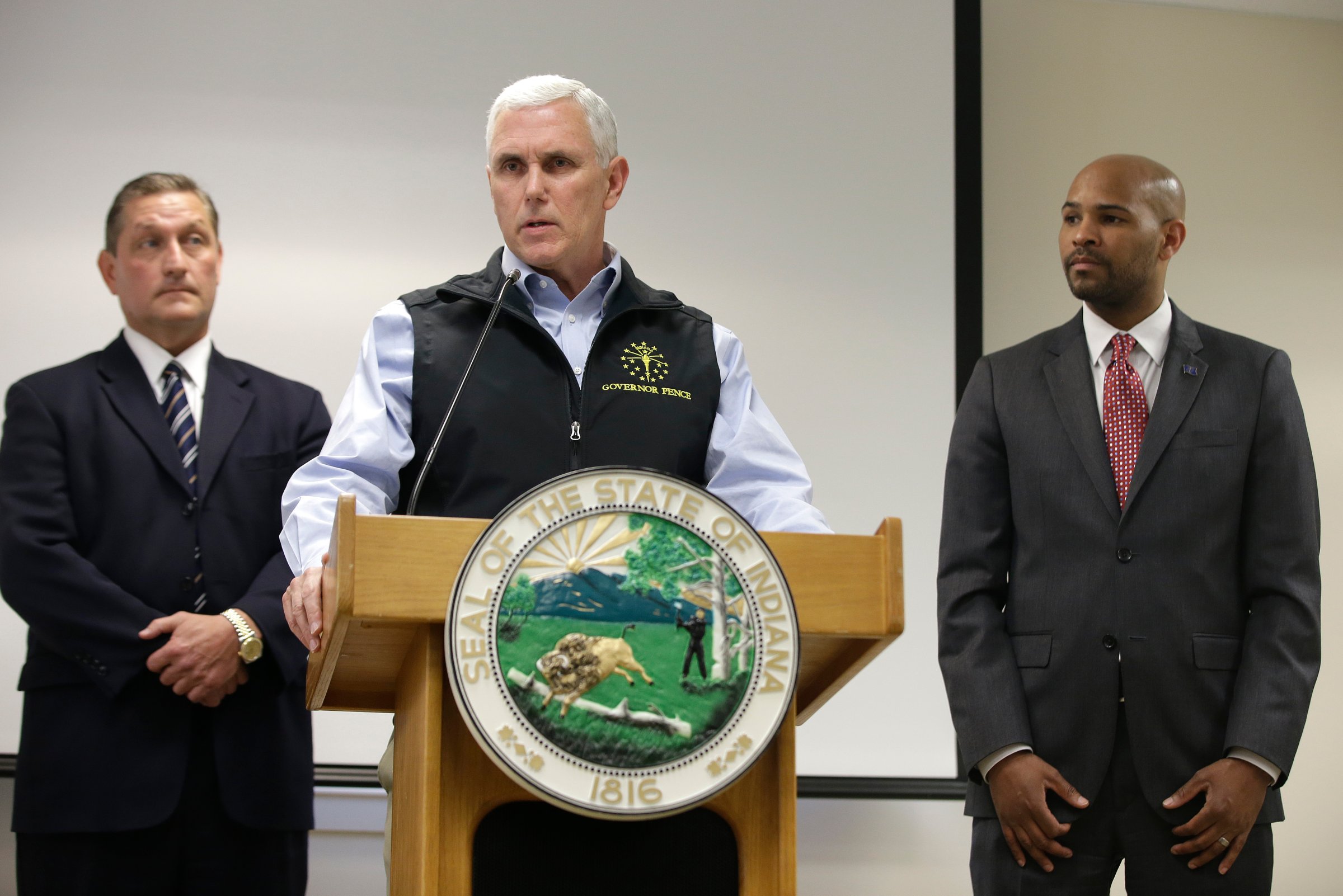 Indiana Gov. Mike Pence responds to a question during a news conference, March 25, 2015, in Scottsburg, Ind.
