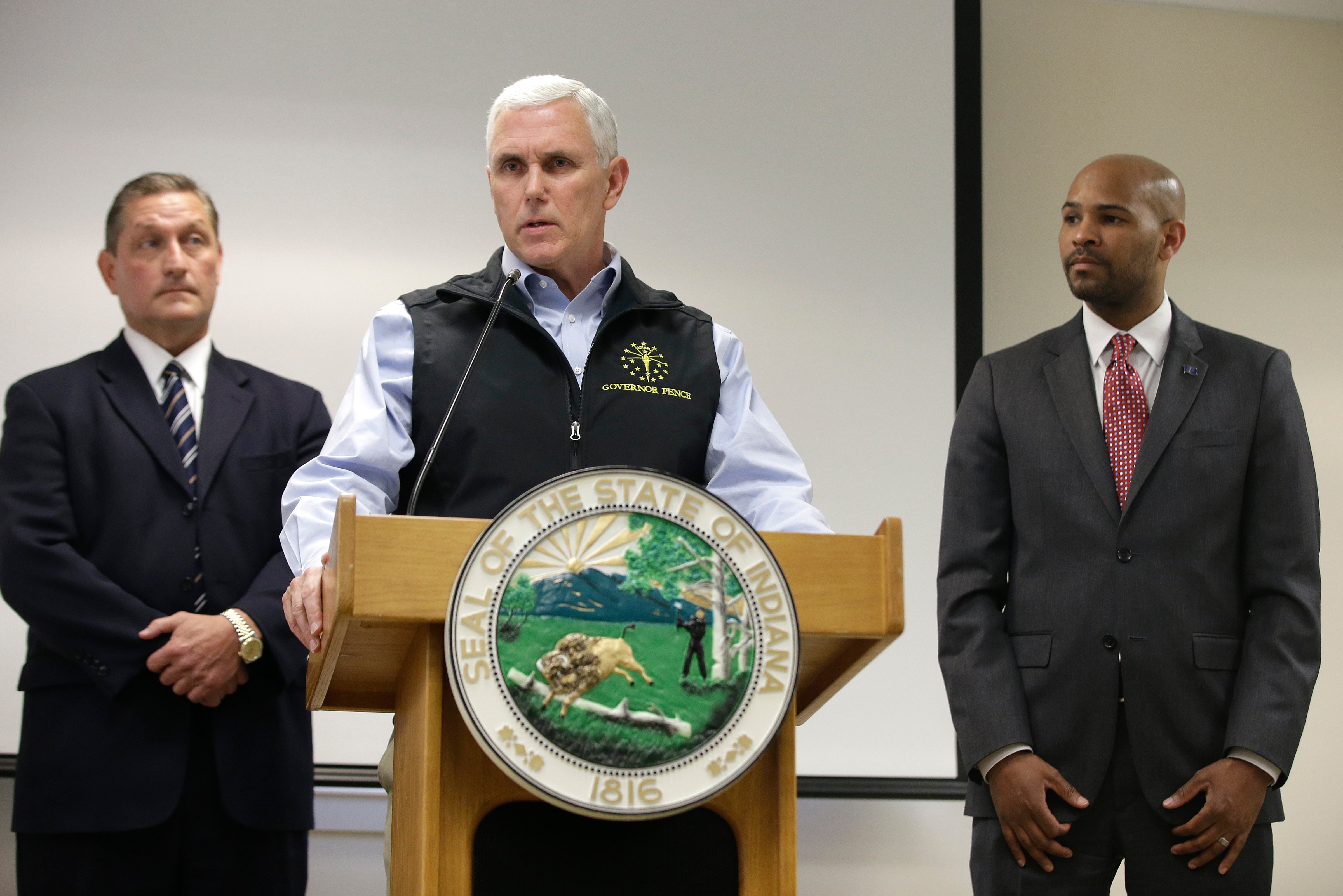 Indiana Gov. Mike Pence responds to a question during a news conference, March 25, 2015, in Scottsburg, Ind. (Darron Cummings—AP)