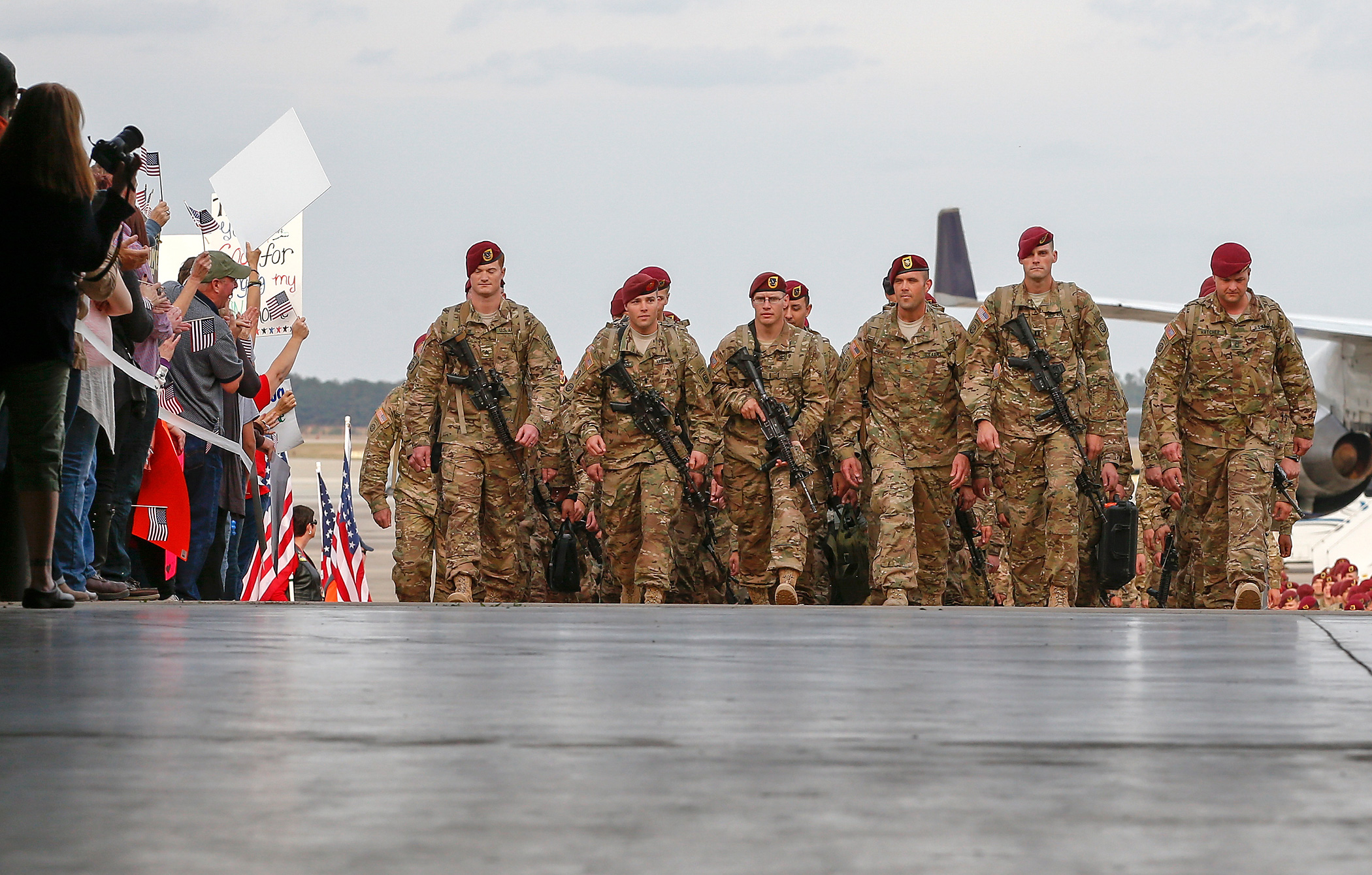 Paratroopers march up the ramp as they return home from Afghanistan at Pope Army Airfield in Fort Bragg, North Carolina