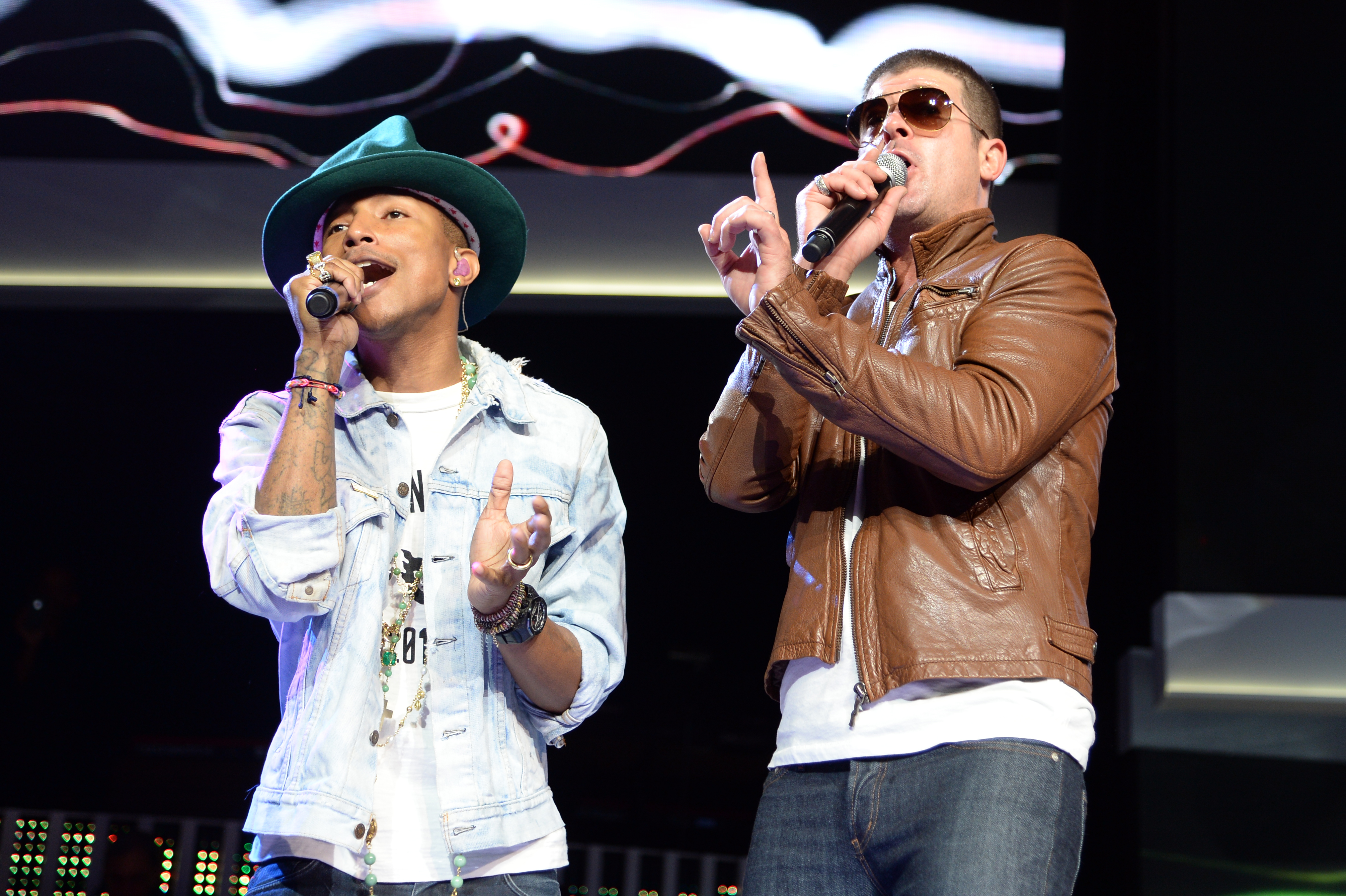 Pharrell Williams and Robin Thicke perform during the Walmart 2014 annual shareholders meeting on June 6, 2014 at Bud Walton Arena at the University of Arkansas in Fayetteville, Arkansas. (Jamie McCarthy&mdash;2014 Getty Images)