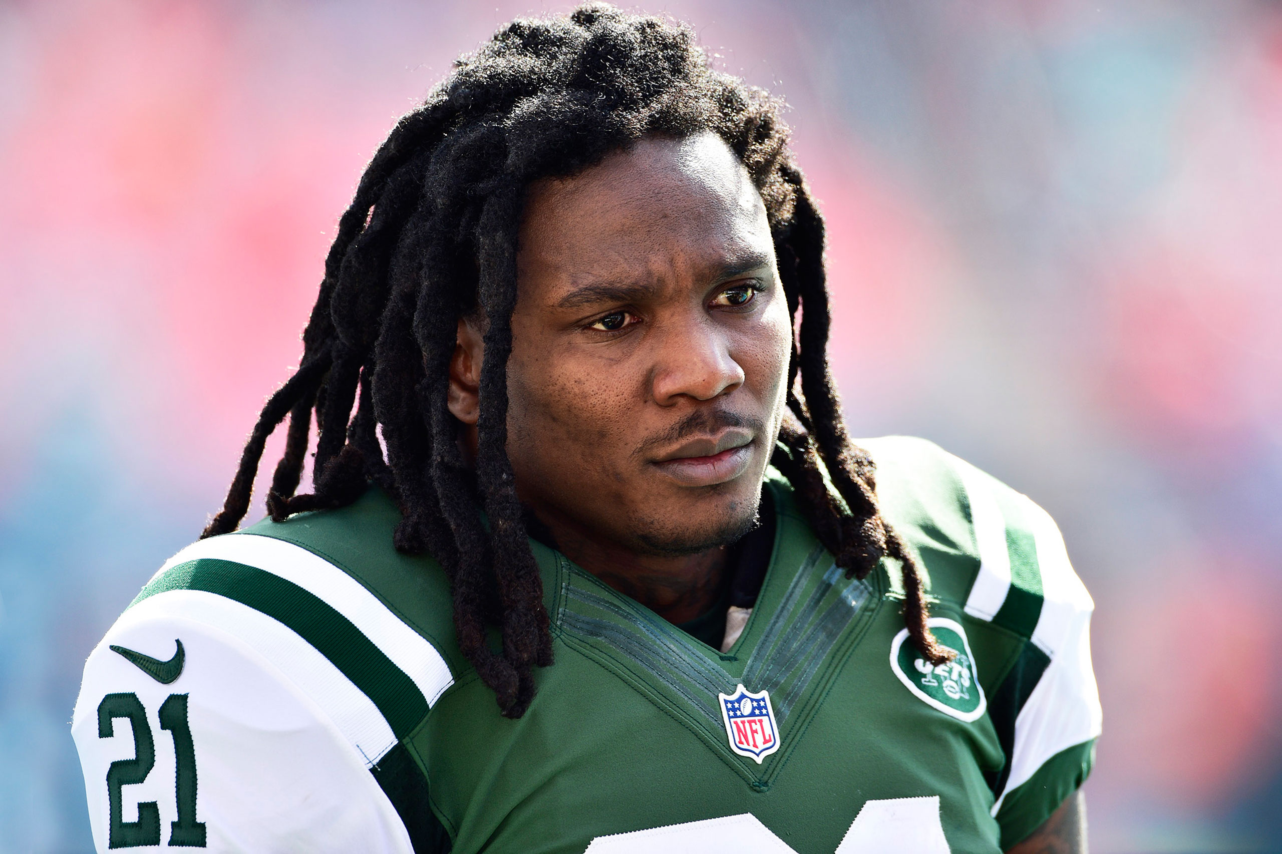 Running back Chris Johnson, then #21 of the New York Jets, looks on before a game against the Miami Dolphins at Sun Life Stadium on Dec. 28, 2014 in Miami Gardens, Fl. (Ronald C. Modra—Getty Images)