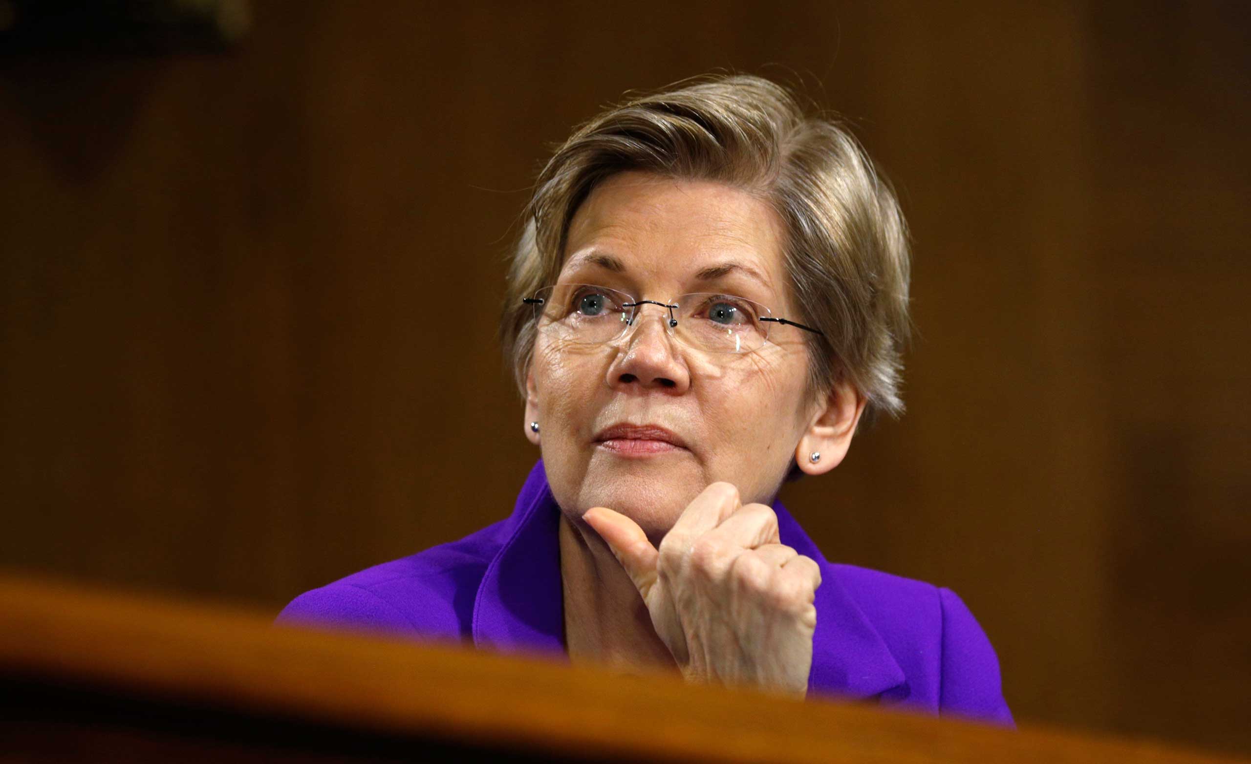 Sen. Elizabeth Warren listens to Federal Reserve Chair Janet Yellen testify during a hearing on Feb. 24, 2015. (Kevin Lamarque—Reuters) (Kevin Lamarque—Reuters)