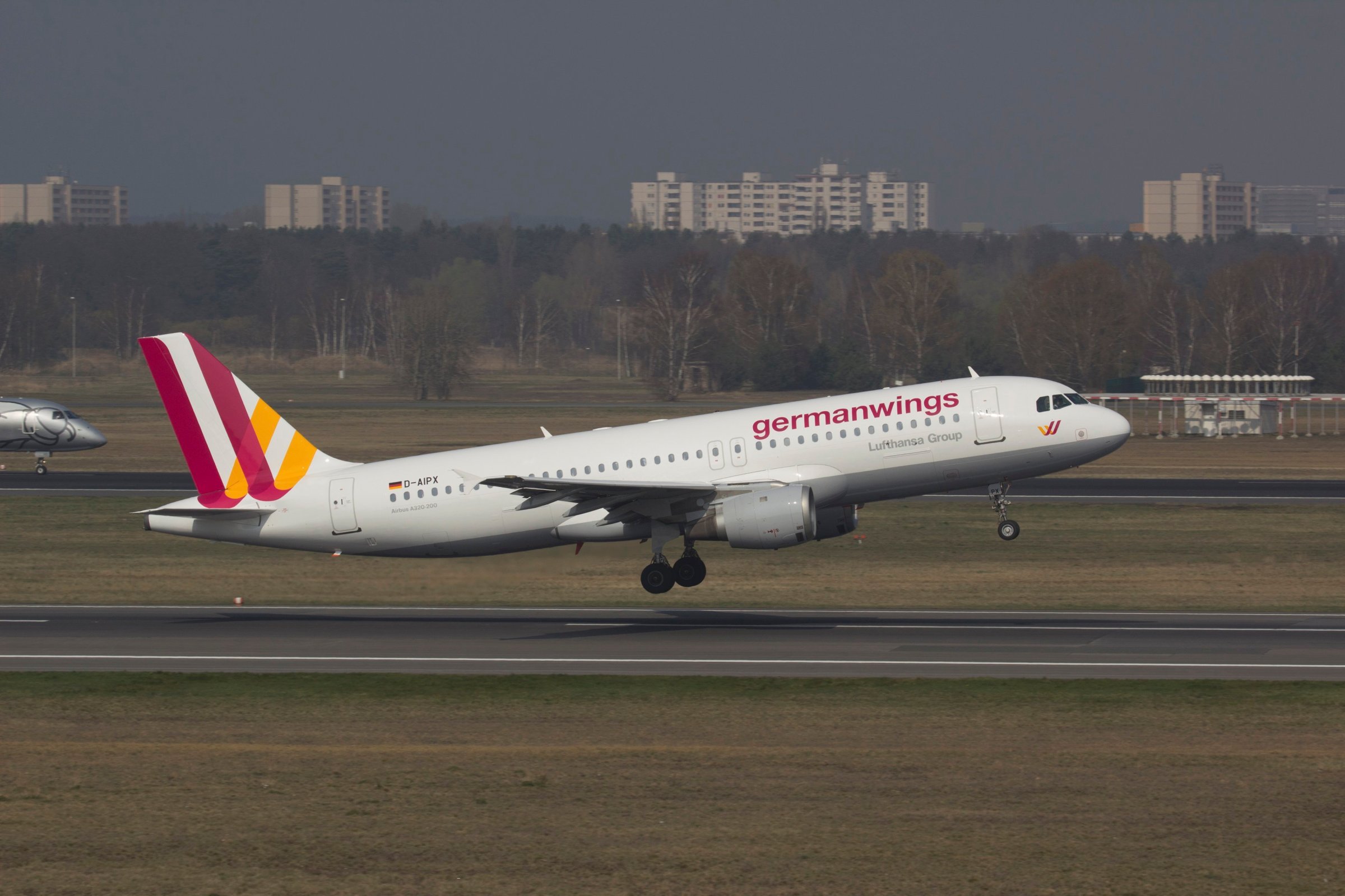 A Germanwings Airbus A320 is seen at the Berlin airport, March 29, 2014. An Airbus plane of the same model crashed in southern France en route from Barcelona to Duesseldorf, on March 24, 2015 police and aviation officials said.