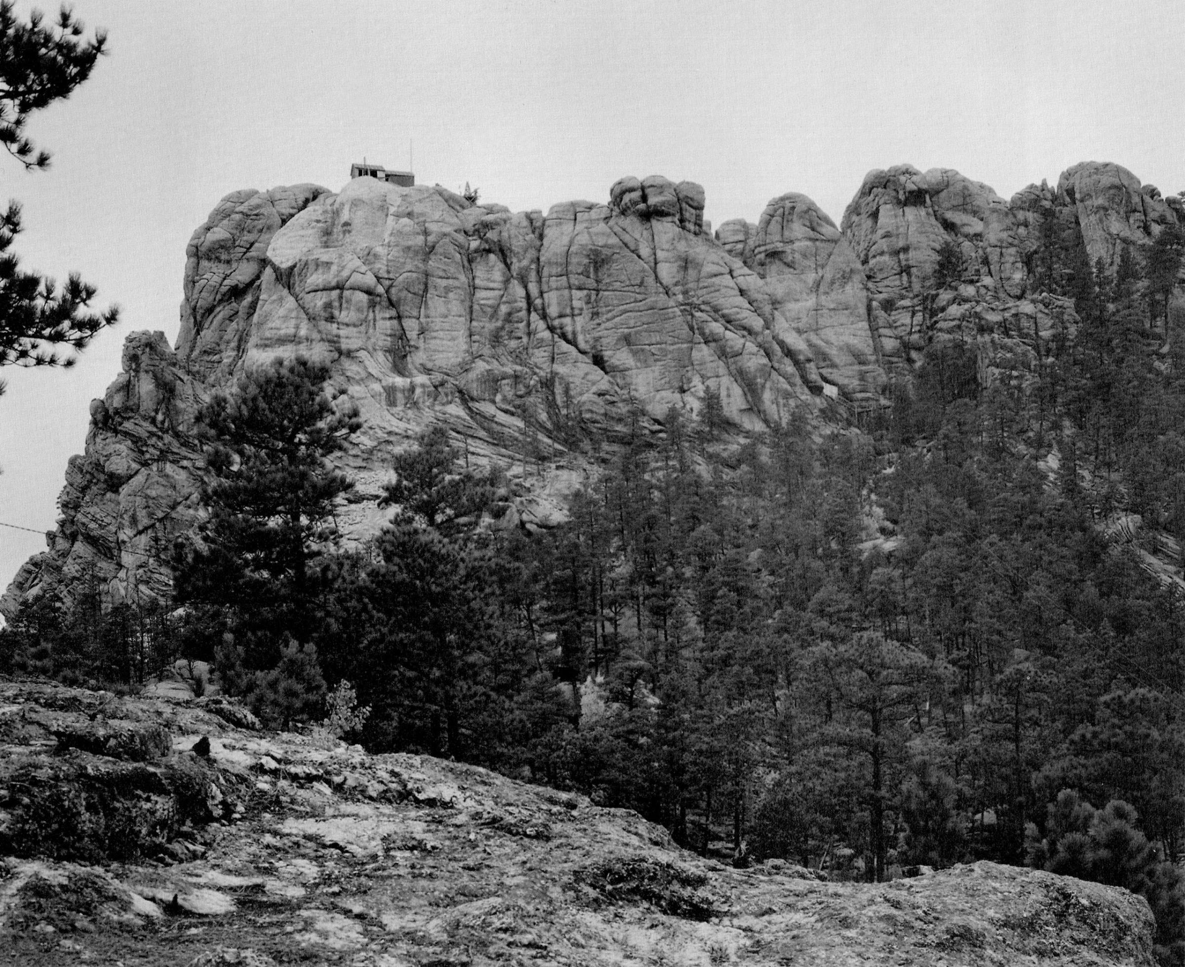 Mount Rushmore with the face of George Washington first beginning to appear, c. 1930s.