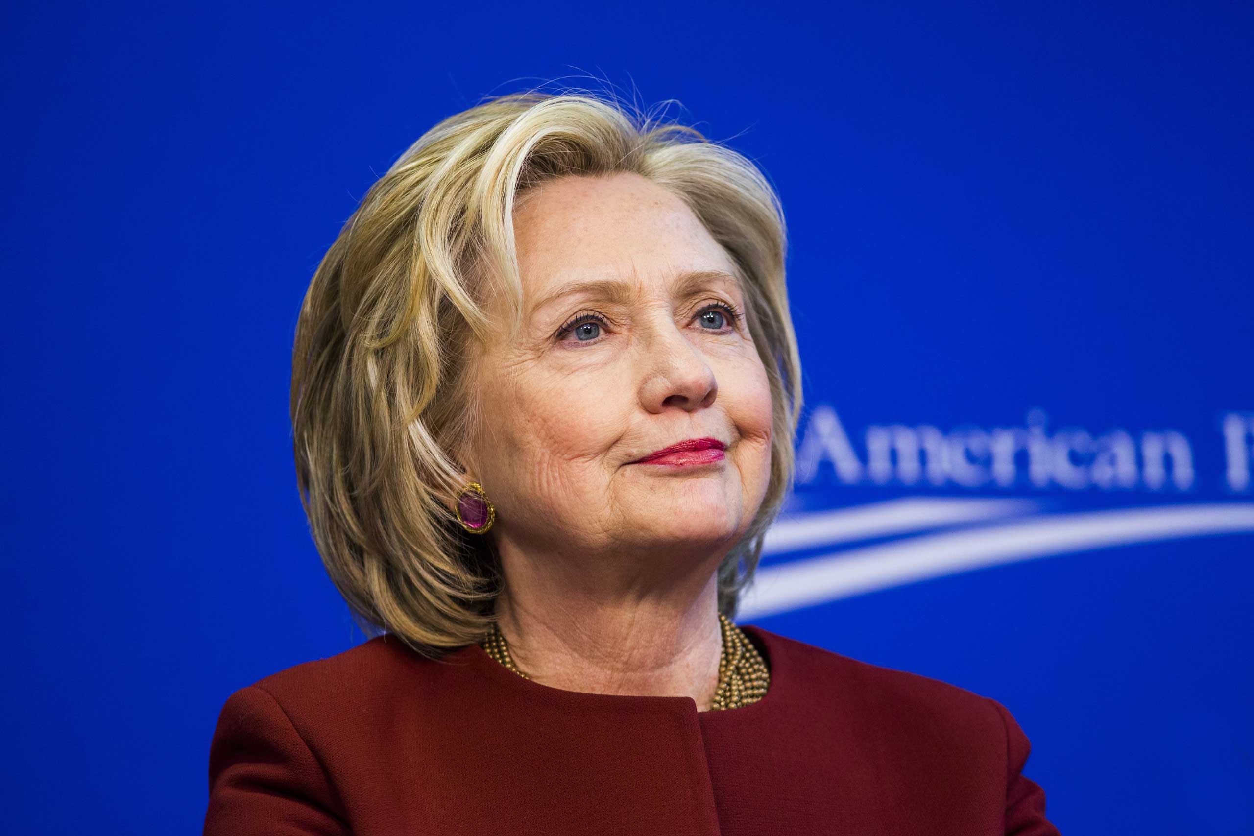 Former U.S. Secretary of State Hillary Clinton takes part in a Center for American Progress roundtable discussion on "Expanding Opportunities in America's Urban Areas" in Washington on March 23, 2015.