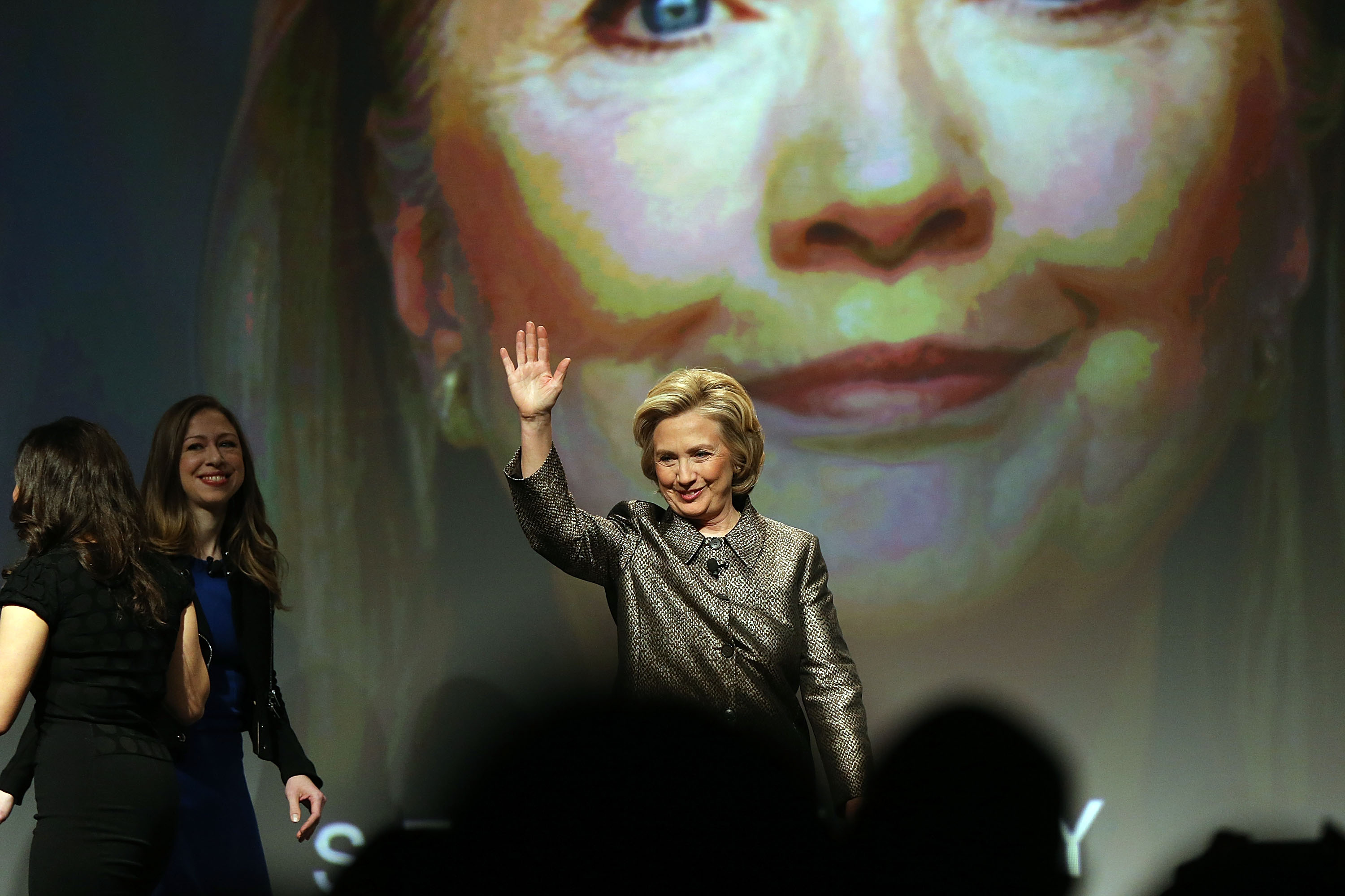 Former Secretary of State Hillary Rodham Clinton walks onto the stage for the official release of the No Ceilings Full Participation Report on March 9, 2015 in New York City.