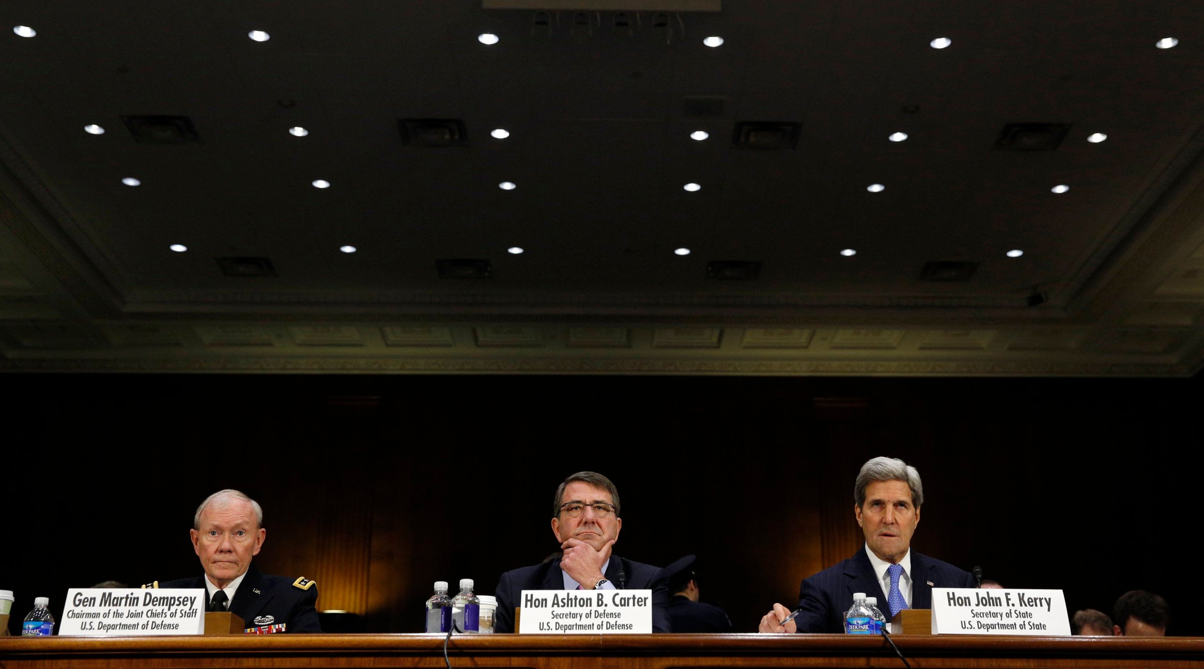 Joint Chiefs of Staff Chairman Army Gen. Martin Dempsey (L), U.S. Defense Secretary Ash Carter (C) and Secretary of State John Kerry testify at a Senate Foreign Relations Committee hearing on "The President's Request for Authorization to Use Force Against ISIS: Military and Diplomatic Efforts" on Capitol Hill in Washington on March 11, 2015.
